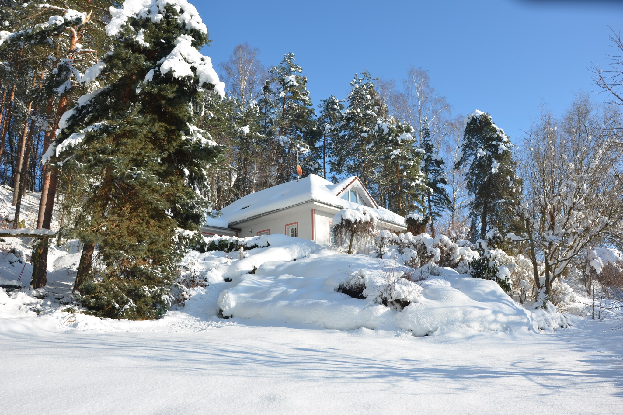 This spacious 4-bedroom holiday home can accommodate up to 8 people, especially families with children. Located near the Ski area, in KlokocÃ­, it is nicely furnished with free WiFi and a private garden.



This home is very near to a forest and there are various restaurants at a distance of 600 m in Na Spici. You can visit the town centre in Turnov and River Jizera at a distance of 6 km each. You can also walk to the nearby fortress ruin Rotstejn or visit mountain city Klokocske Skaly. General Supplies store is just 100 m away.



This lovely holiday home has a barbecue and a garage. Parking is also available on the premises. The public transport is accessible at a distance of 500 m. 



The nearest airport is 100 km away.

