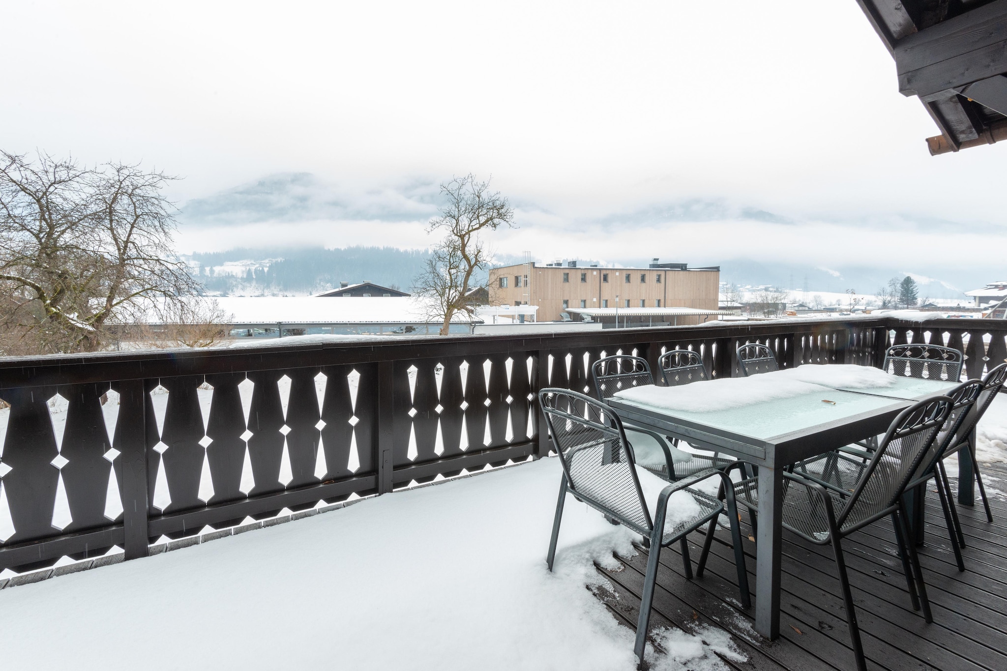 Ground floor: (Living room(TV, game computer, terrace), Kitchen(cooker(ceramic), oven, combination microwave, dishwasher, fridge-freezer), bedroom(double bed, double sofa bed, TV), bedroom(double bed, bunk bed), bedroom(double bed), Bedroom with bathroom(double bed, shower, 2x washbasin, toilet), bathroom(bath tub, shower, 2x washbasin, toilet), relaxation area(tumble dryer, shower, sauna, toilet, washing machine))\n\nski storage, carport, heating(floor heating), garden, parking