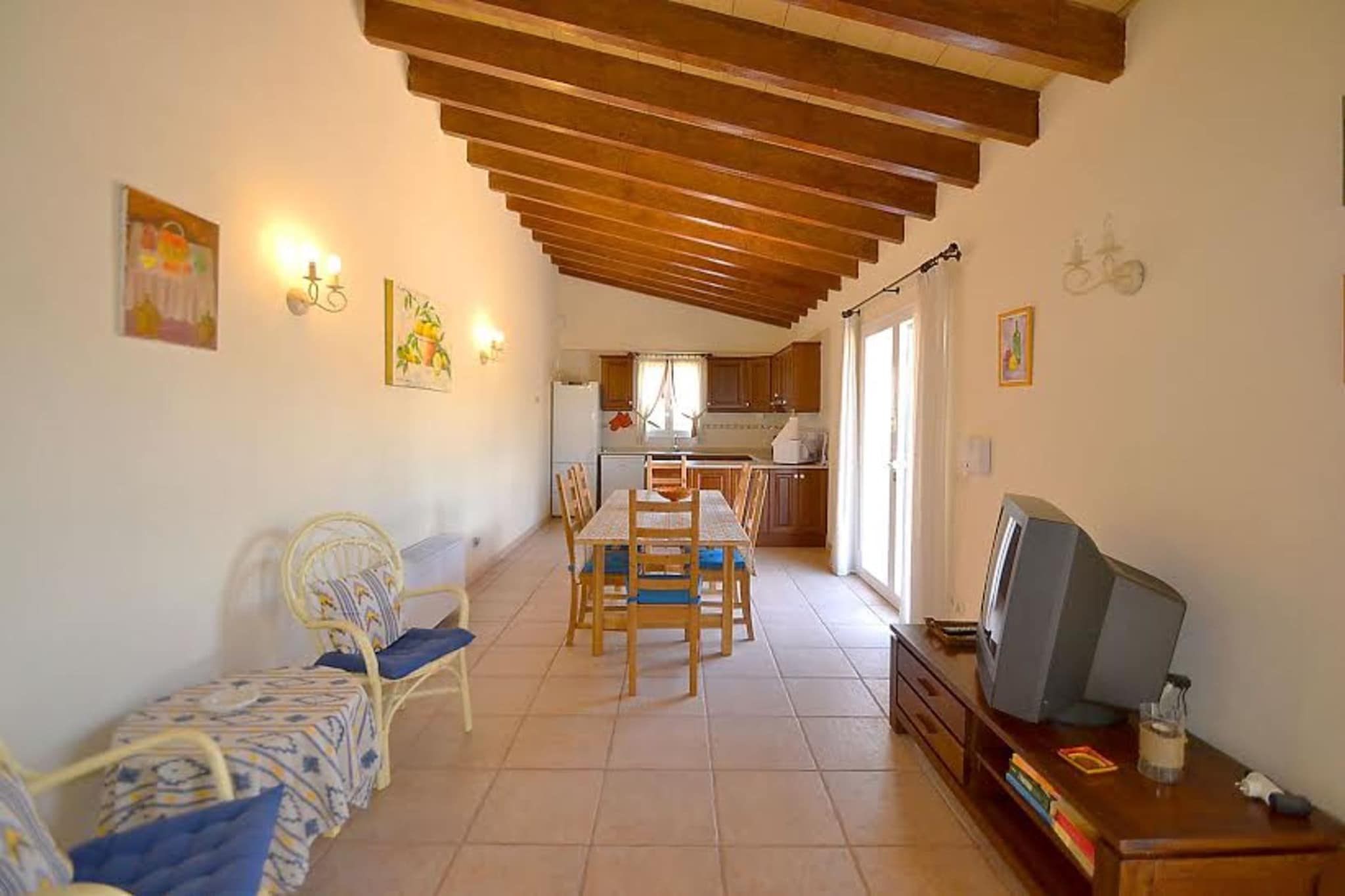 Escape to the serene countryside of Binissalem and experience comfort at this modern country house. Nestled in a quiet setting, this fully equipped and furnished retreat blends contemporary style with traditional Majorcan charm, offering a perfect haven for large groups of families or friends. Dive into refreshing waters and soak up the sun in the privacy of your own private swimming pool. Surrounded by covered terraces overlooking the lush garden, the pool area provides the ideal spot for relaxation and leisurely outdoor gatherings. 

 Situated in the center of the island of Mallorca, Binissalem is renowned for its tranquil atmosphere, picturesque landscapes, and rich cultural heritage.  Surrounded by natural beauty, Binissalem offers ample opportunities for outdoor recreation and exploration. The surrounding countryside is ideal for hiking, cycling, and nature walks, with scenic trails winding through vineyards, olive groves, and pine forests. The house is conveniently located just 5 kilometers away from general supplies, ensuring easy access to essentials during your stay. 

Spread across two floors, the ground floor features a spacious living room, perfect for socializing and unwinding with loved ones. Two bedrooms and a separate bathroom offer comfortable accommodation for guests, with air conditioning ensuring a pleasant stay year-round. Prepare delicious meals in the fully equipped kitchen, complete with modern appliances and ample counter space. Additional amenities include a parking facility for added convenience.
