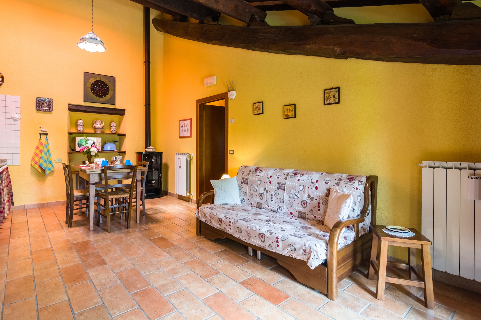 This cozy, pet-friendly apartment near CittÃ  di Castello offers a peaceful Umbrian escape for up to seven guests. Located in Via Abbadia, it features a spacious kitchen with modern appliances, a welcoming living room with a fireplace, and two adaptable bedrooms to suit different group arrangements. A sofa bed adds extra sleeping space, and the bathroom is thoughtfully equipped with an accessible shower for guests with mobility needs.

Outdoors, guests can relax in the lush shared garden, furnished with loungers, a parasol, and a barbecue area for alfresco meals. The large shared swimming pool (17x7 m, open Mayâ€“Sept) is ideal for warm afternoons, while play equipment and fitness facilities make this retreat suitable for families and active travelers alike. The serene countryside encourages strolls and cycling adventures just outside your door.

Just 9 km away, CittÃ  di Castello awaits with Renaissance architecture, vibrant cultural sites, and artisan markets. Sample Umbrian cuisine at Osteria Le Civette or explore nearby gems like Montone, Monterchi, and Sansepolcro. Whether you're unwinding by the pool or discovering historic towns, this apartment offers a restful and enriching base.