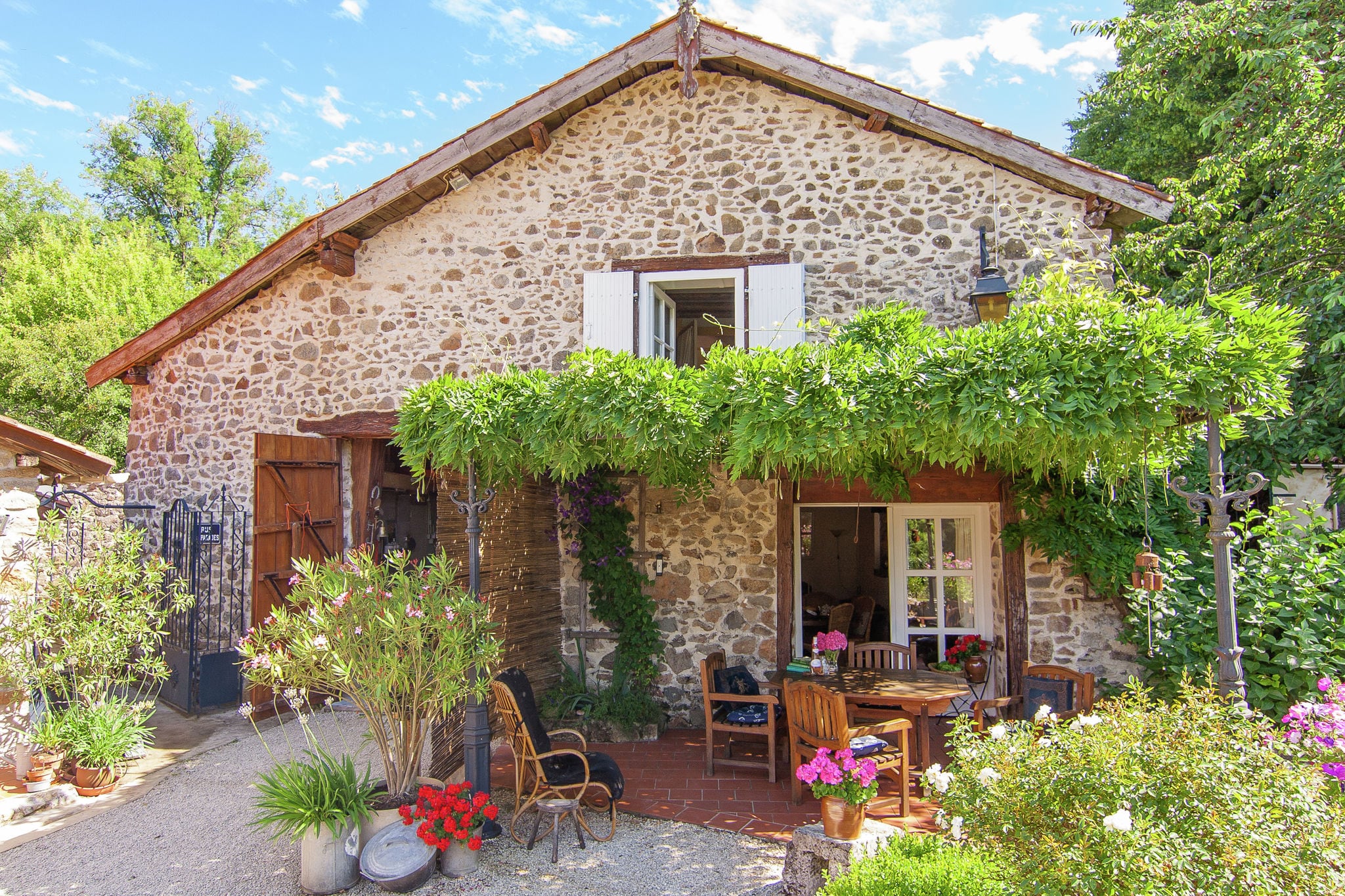 Detached, romantic cottage with communal swimming pool, terraces and large garden