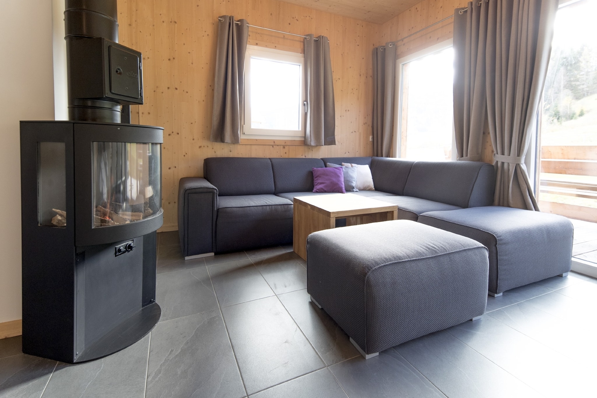 "Welcome to your perfect retreat in the heart of St. Georgen ob Murau, located at the renowned Kreischberg Valley Station. This exclusive holiday home spans 100 mÂ² and comfortably accommodates up to 9 guests, making it an ideal choice for families or groups seeking a luxurious escape. The chalet features three inviting bedrooms with double beds and an additional bedroom with a bunk bed and a single bed, offering ample space for everyone. With two stylish bathrooms equipped with either a refreshing shower or a relaxing indoor whirlpool tub, and hairdryers provided, your comfort is ensured. 

Situated at the top location of Kreischberg Valley Station, you have direct access to world-class skiing and snowboarding in the winter, and scenic hiking and biking trails during the summer. Your stay also includes the Murau-Murtal GuestCard (summer), providing you with various benefits and discounts to enhance your alpine experience. 

The spacious living-dining area is designed for relaxation and socializing, featuring a cozy seating arrangement and a flat-screen TV for your entertainment. The open kitchen is a culinary haven, fully equipped with everything you need to prepare delicious meals. This includes cutlery, cookware, a ceramic hob, oven, dishwasher, and a fridge with a freezer compartment. Complementing these are essential appliances such as a toaster, kettle, and coffee machine. To start your stay off right, a small starter set with dishwasher tabs, dishwashing liquid (sample), sponge, garbage bags, cleaning supplies, and a tea towel will be ready upon your arrival. 

Stay connected with free Wi-Fi and enjoy a variety of channels on satellite TV. "