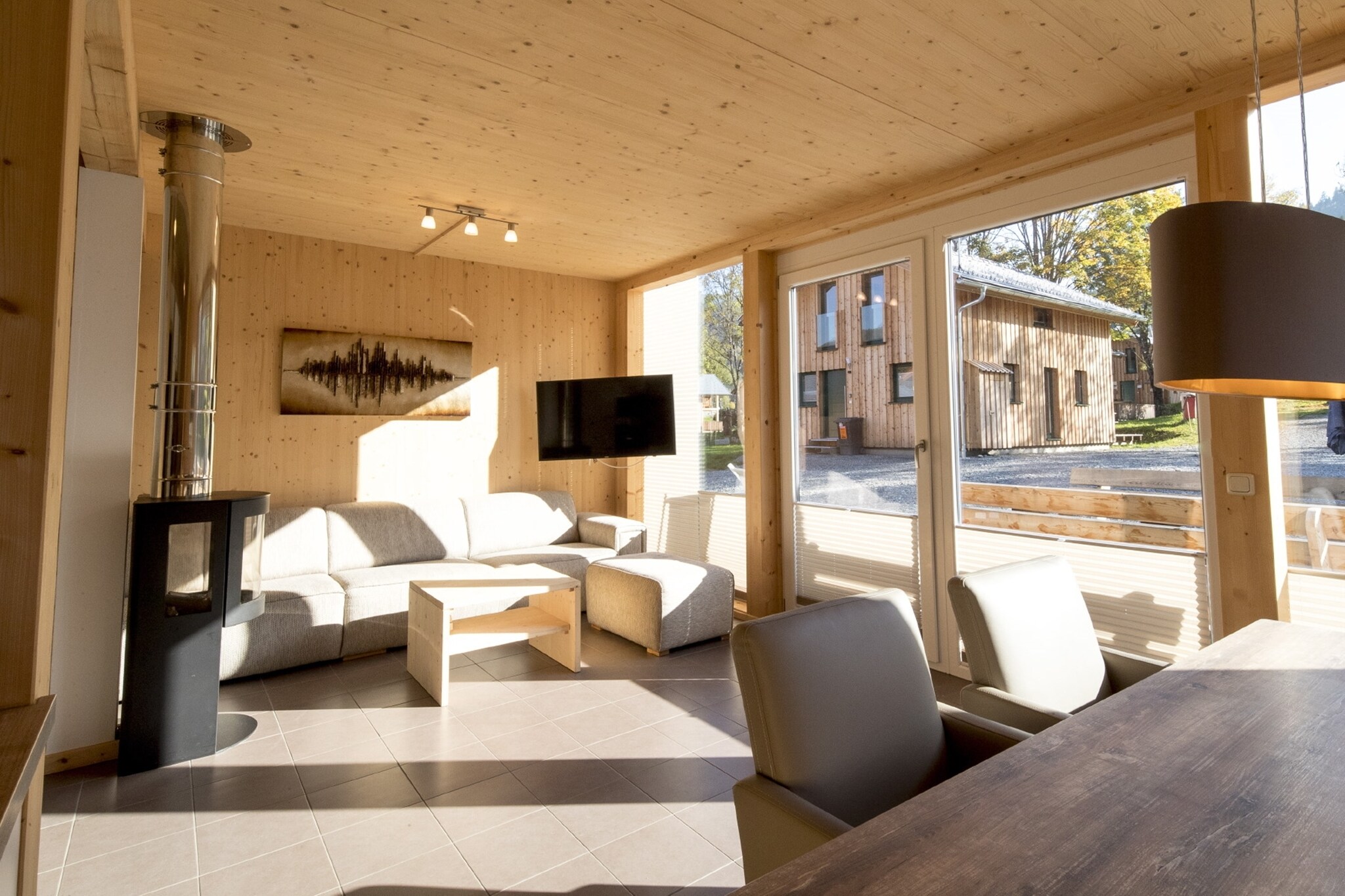 Ground floor: (hallway, Living room(TV(satellite), gas fireplace), open kitchen(electric kettle, toaster, cooker(ceramic), coffee machine(filter), oven, microwave, dishwasher, fridge-freezer, dishes and cutlery(Bowls, chopsticks, plates, cups, etc.)), bathroom(shower, sauna, washbasin, toilet), Internet access)\n\nOn the 1st floor: (bedroom(2x single bed), bedroom(double bed), bedroom(double bed), bedroom(double bed), bathroom(Bubble bath, shower, washbasin, toilet, hairdryer))\n\ncot, Bubble bath(outside), ski boot heaters, heating(electric, central), terrace, garden, garden furniture, parking, high chair