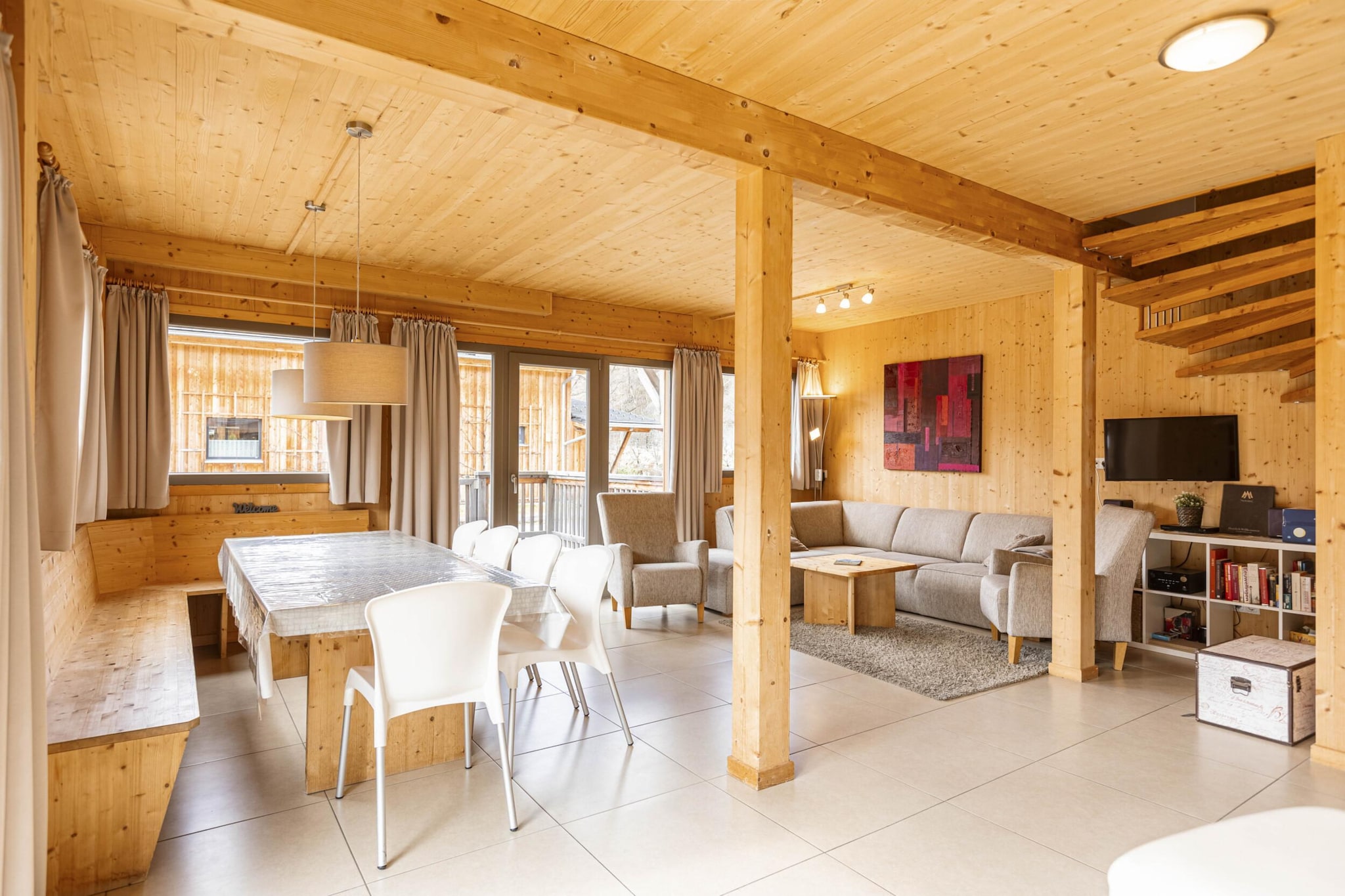 Ground floor: (hallway, Living room(TV(satellite), DVD player, DVD player, radio, CD player, gas fireplace), open kitchen(hob(4 ring stoves, ceramic), electric kettle, toaster, cooker(ceramic), coffee machine(espresso, filter), oven, grill, microwave, dishwasher, fridge-freezer, Blender, dishes and cutlery(Bowls, chopsticks, plates, cups, etc.)), bathroom(shower, washbasin, toilet, hairdryer), toilet(toilet), Internet access, terrace)\n\nOn the 1st floor: (bedroom(double bed), bedroom(double bed), bedroom(2x single bed), bedroom(double bed, bunk bed), bathroom(shower, sauna, washbasin, toilet, hairdryer))\n\nBubble bath, storage, ski storage, carport, washing machine, ski boot heaters, heating, terrace, garden, garden furniture, parking, parasol, table football, children\'s bed, high chair, drying cabinet