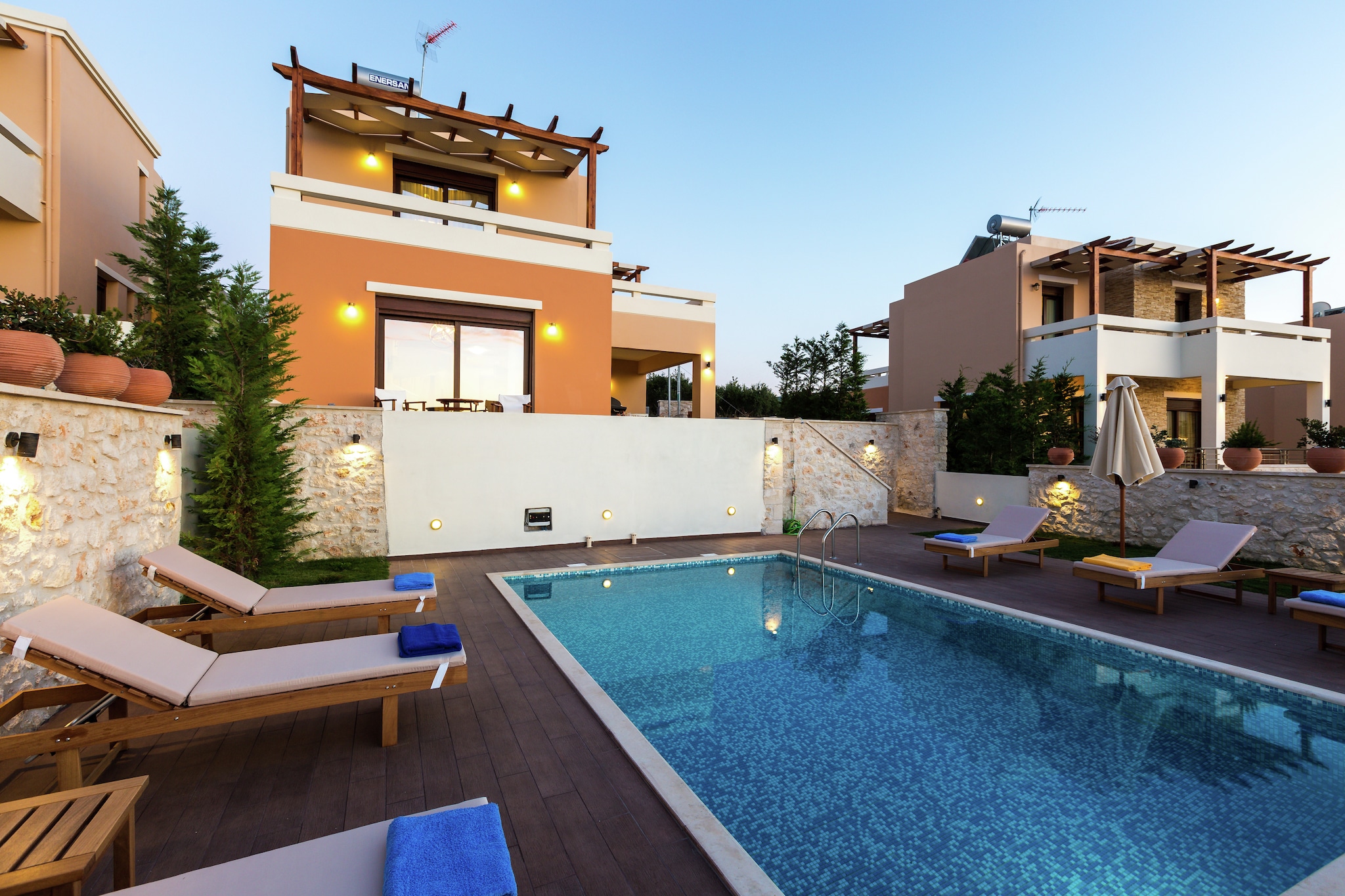 Tucked away in the tranquil village of Arkadi, this charming 3-bedroom villa offers a serene escape for families or small groups seeking a blend of comfort, privacy, and authentic Cretan charm. With space to accommodate up to seven guests, the villa is perfectly positioned for exploring the cultural richness of Rethymno, Chania, and Heraklion, while still providing a peaceful retreat surrounded by nature. The setting is ideal for those who want to unwind in a quiet environment without being far from the island’s vibrant towns and beautiful beaches.

The villa’s highlight is its private panoramic swimming pool, offering sweeping views of the surrounding landscape and a perfect spot for sunbathing or relaxing with a book. The spacious terrace and garden are furnished for outdoor dining and leisure, creating a seamless indoor-outdoor living experience. Inside, the villa is fully air-conditioned and features a cozy living room with entertainment options, a well-equipped open-plan kitchen, and three comfortable bedrooms, each thoughtfully designed to ensure restful nights.

Just a short walk from a local restaurant and a few kilometers from the sea and supermarkets, the villa offers both seclusion and accessibility. Guests can enjoy peaceful evenings under the stars or venture out to explore the nearby towns for dining, shopping, and sightseeing. With cleaning and linen service every third day and a policy that ensures a quiet, family-friendly atmosphere, this villa is more than just a place to stay—it’s a home away from home where unforgettable memories are made.