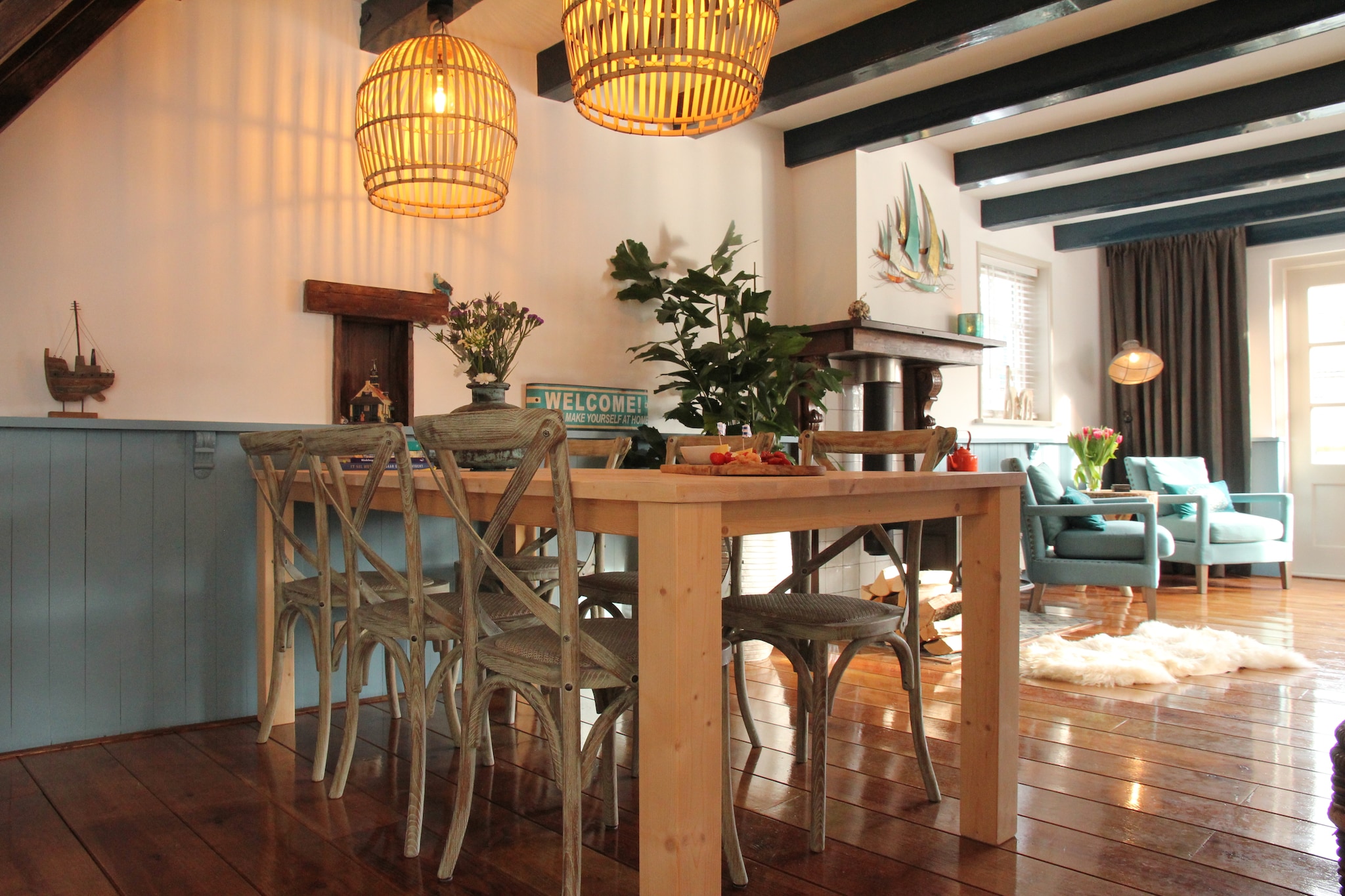 An optional utilities and service fee of EUR 60,00 will be charged before your arrival. Details are given below.<br> This holiday home in Hindeloopen offers a comfortable and rustic retreat with modern touches. The ground floor features an open kitchen, fully equipped with an electric kettle, gas cooker, oven, dishwasher, and fridge-freezer. The inviting living/dining room includes a digital TV with Dutch and German channels, a dining table, a cozy wood stove, and comfortable seating. A convenient toilet is also on this level. Upstairs, you'll find two sleeping areas and a bathroom with a shower, two washbasins, and a toilet. The property benefits from central heating throughout. Outside, garden doors lead to a private, furnished garden with deckchairs and a BBQ, perfect for outdoor relaxation. Bicycles are available for rent upon request. Hindeloopen itself is renowned as one of Europe's most beautiful small towns, offering charming narrow streets, picturesque alleyways, and scenic bridges - ideal for strolls. You can take a refreshing dip in the nearby lake, just 100 meters away. For outdoor enthusiasts, cycling through the serene Frisian meadows provides a wonderful way to experience the local landscape. <br><b> Optional Utilities & Service Package </b><br><b> An optional utilities and service package of EUR 60,00 </b> can be selected prior to your arrival. You will receive a separate communication with the payment link should you wish to include it.<br>This package ensures a seamless stay and conveniently covers services such as final cleaning, utility consumption, service support, and protection against minor damages or incidental costs during your stay.<br>Guests who prefer may manage these services independently, provided the property is returned in good order at check-out.