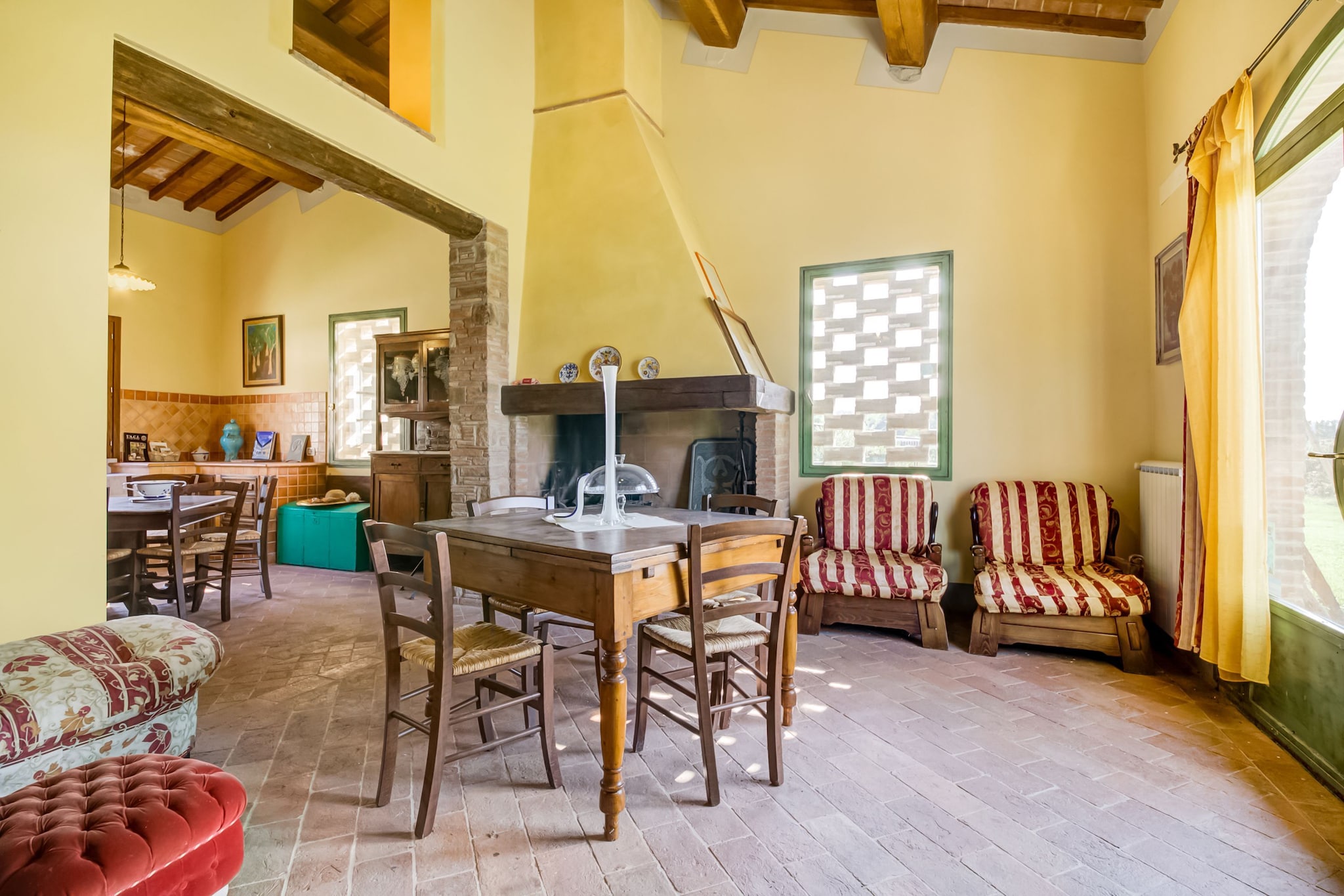 Ground floor: (Living room(dining table(8 persons), fireplace, stereo unit, high chair), Large kitchen(dining table(8 persons), cooker(5 ring stoves), oven, microwave, fridge-freezer, washing machine(paid)), bedroom(2x single bed, bunk bed), bedroom(single bed, double bed), bathroom(bathtub with shower, washbasin, toilet, bidet, changing mat), bathroom(shower, washbasin, toilet, bidet), terrace(private), garden(shared with other guests), garden furniture)