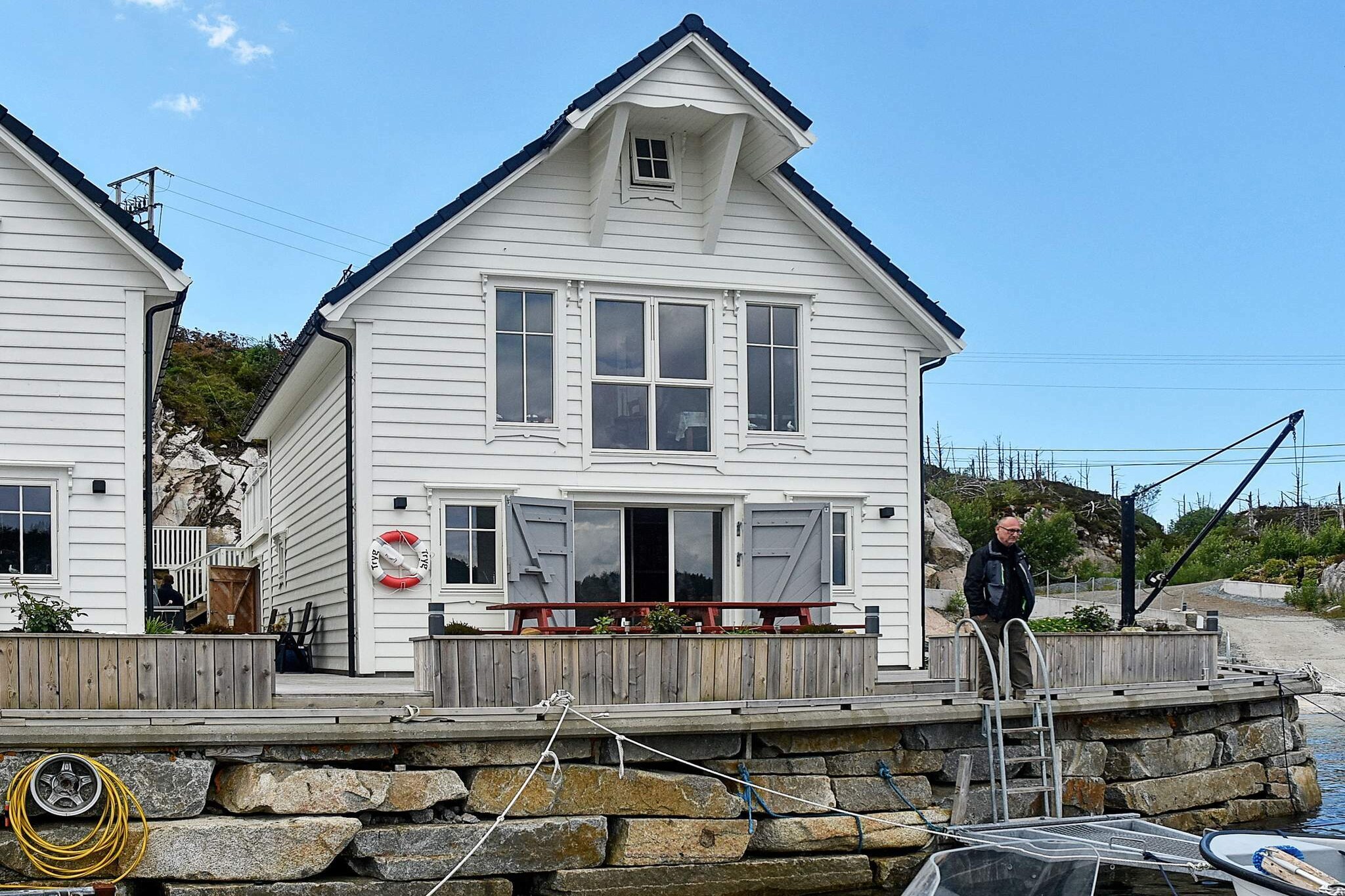 Great holiday cottage built in a traditional "rorbu" style, with a south-facing and sheltered location. There is a dock right by the cottage and the good fishing spots are close by. The cottage has a maritime atmosphere, and a modern living room and kitchen section on both floors. The large windows allows you to look down on the fjord and dock. The single beds can be combined into double beds. The bedrooms on the 1st floor has a normal height in the middle and a slanting roof. The largest bathroom has a changing table for babies. There is floor heating in most rooms except in the bedrooms on the ground floor. There are several international channels and internet with a big capacity. There is a rougher, maritime style on ground floor, with large doors in a boat house style that are located outside of the insulated terrace door of glass. These doors open independently of the glass door. There is a 41 m² terrace outside with 2 tables and benches. Enjoy your meals outdoors on sunny days. There is another terrace on the other side of the cottage with a large room with a freezer, storing of fishing equipment and a fish cleaning table with running water and lighting. 10 metres from the house there is a small, private sandy beach where you can go swimming. In addition to the signed hiking trails 1 km away, you can go for walks along the heather hills nearby. Two identical boats are available for rent: 18 ft Sting 535 Pro with 40 hp Evinrude 4-stroke motors, Garmin Sonar Map 50 Series chartplotter/GPS/sonar, 4 rodholders and life jackets. The area has excellent fishing conditions all year round. Islands and protecting fjords shelters and ensure that fishing is possible on days with bad weather. 5 km to a lake with trout up to 1 kg. NB! Children should wear life jackets when on the terrace by the sea. The closes neighbour is unit 48764, 3 metres from the house. The payment of boat and house deposit needs to be in cash (NOK or EUR). Extra services to be paid by bank card/credit card.