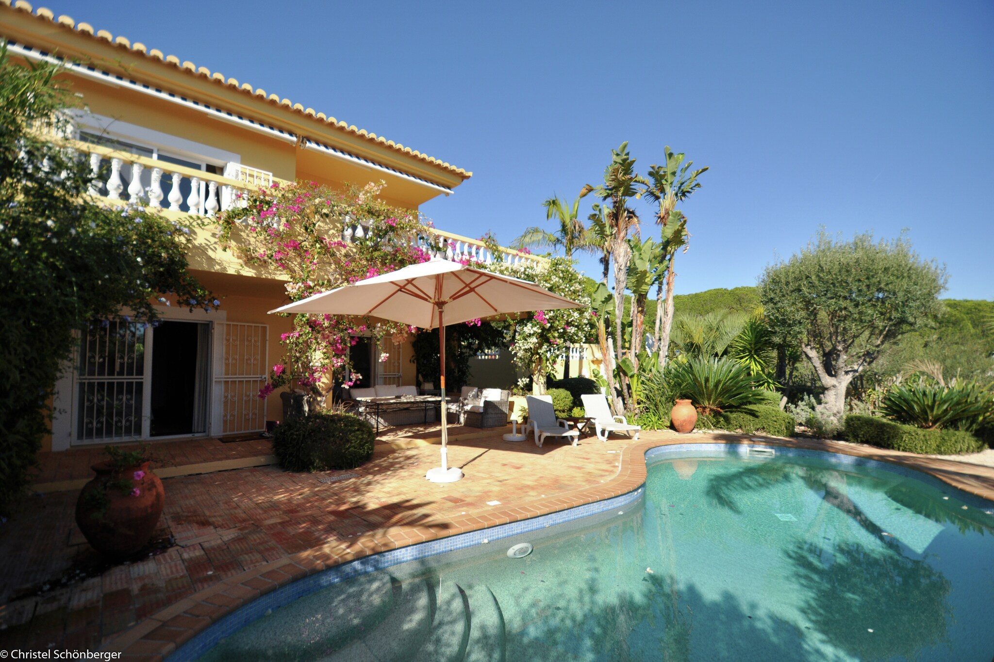 Located in Lagos near Meia Praia beach, this holiday home has 2 bedrooms for 2 people. Guests can relax in the private swimming pool and access free WiFi here. For reasons of tranquillity, this holiday home will not be rented to groups of youngsters. 
You can go down to the Meia Praia beach, 300 metres away, to enjoy a day in the sun. For water sports, visit the Marina de Lagos (1.5 km). You can also visit the town center of Lagos and explore. 
Guests can cozy around a hot barbecue in the garden with garden furniture, private terrace or by the poolside. A tumble dryer and washing machine are also available. The kitchen is equipped with an electric kettle, coffee machine, oven, microwave and refrigerator. This property also features a balcony, air conditioning facility, seating area, deck chairs, bathtub with shower, carport and a parasol. 
Public transport is available 300 metres away while a train station is located at a distance of 1.5 kilometres. The nearest airport is 75 kilometres away. Costs for late arrivals -From 20pm – 22pm – 30 euros -From 22pm  - 00h – 50 euros - From  00h – 2pm – 100 euros
About Belvilla
When you stay in a Belvilla home, you can rest assured of a unique holiday home in ideal surroundings at an attractive price. The portfolio of accommodations consists of more than 40,000-holiday homes in 20 European countries. Interested in a weekend getaway, a summer or winter sports holiday or simply a short break? Do you prefer the coast, the countryside or the mountains? Whatever your preference, there is a Belvilla home to meet your needs, from a cosy gîte for two to a castle big enough for the entire family, from an apartment in the heart of Rome to a cabin in the middle of nowhere, from a simple tree house to a luxury dream villa and from close to home to the other side of Europe.
A Belvilla home gives you the freedom to enjoy breakfast in your pyjamas or continue a good conversation into the morning hours without having to worry about the bar's closing time. Prepare gourmet meals with fresh local ingredients in your own kitchen and take advantage of having your own swimming pool to do as many cannonballs as you want! In other words, you can enjoy complete privacy in your home away from home.