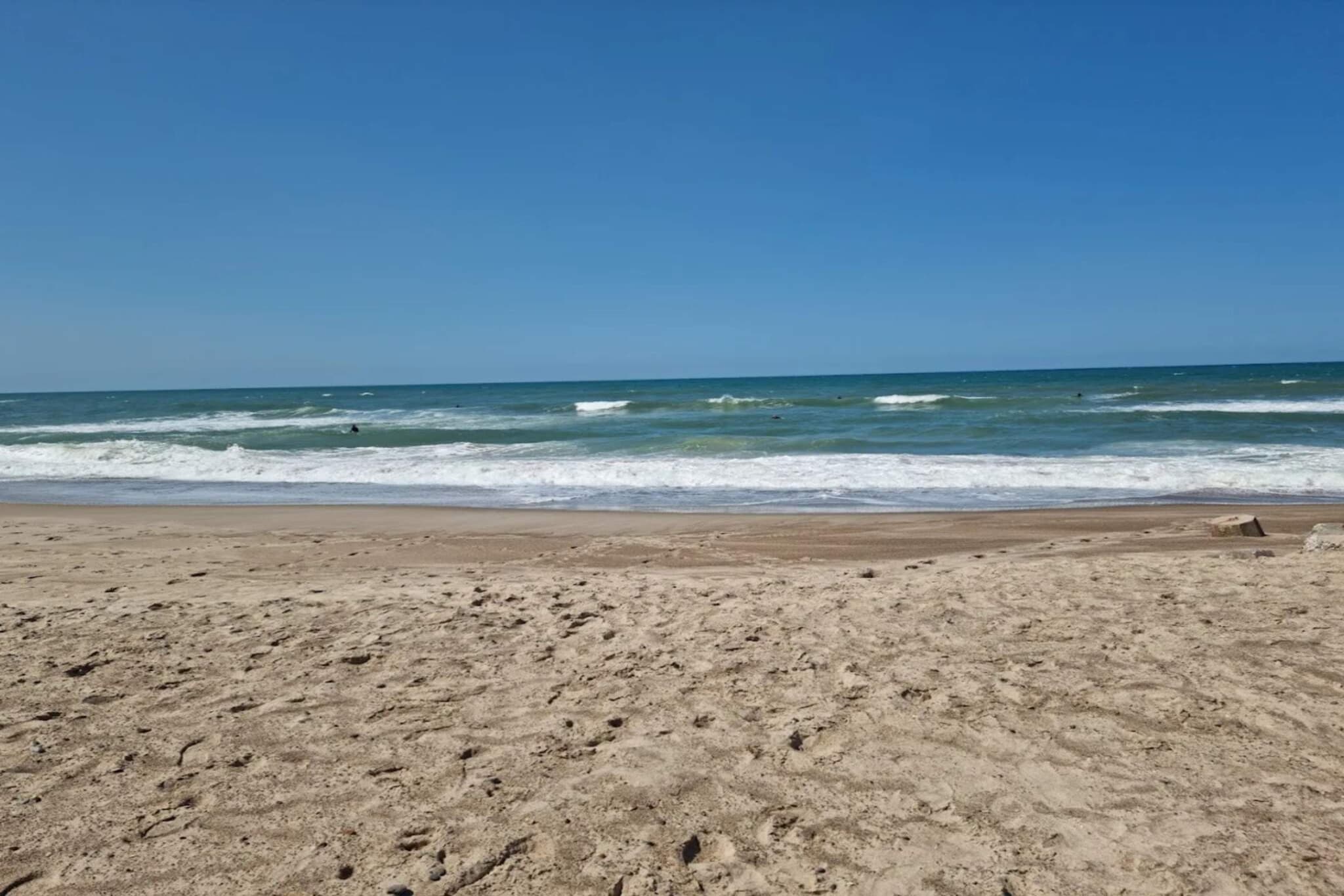 Ontsnapping aan zee met schommel - Waterzicht