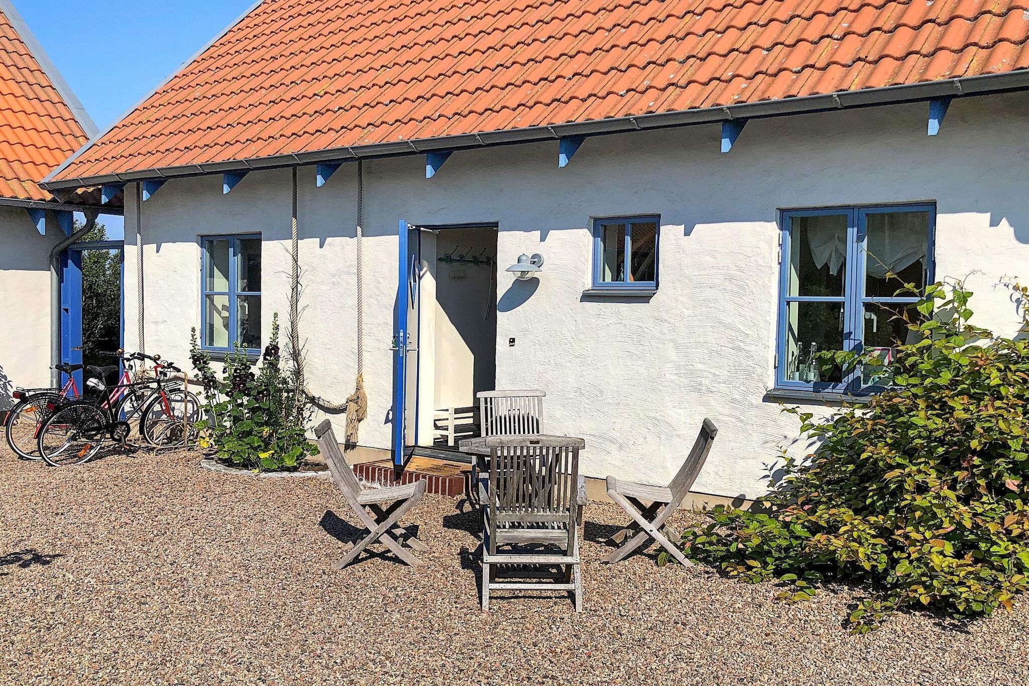 This well-kept holiday home is situated close to the sea, in a very attractive part of Halland. The countryside in this part of the country is amazingly beautiful. The holiday home is set on the same plot of land as the house that the landlord lives in. Your part of the land is secluded by a plank fence which offers you privacy.  The bottom floor of the cottage features a charming kitchen, well equipped and comfortable.There is a nice bedroom with two single beds and a top-notch bathroom with a WC and a shower. On the second floor you will find a lovely bedroom with a beautiful view and a skylight. There is also a cosy little room with a TV and a sofa bed.  From the lovely garden there's a 400 metre walk down to the sea. This area, Utteros, is famous for it's bird-watching. There are a variety of charming seaside towns nearby, such as Varberg, Kungsbacka, and Falkenberg. Falkenberg offers plenty of beautiful walking paths and excellent fishing opportunities. There are also tennis- and riding possibilities. Stroll through the Old Town and admire the picturesque view, stop for a coffee in one of Falkenberg's excellent cafÃ©s, such as StÃ¥hlbom's. Take a walk along the River Ã„tran and admire the stunning view.  Another nice place to visit is TylÃ¶sand, one of Sweden's most famous and popular beaches, several kilometres ling. It is situated close to Halmstad, a larger town offering shopping, culture and entertainment. Your holiday home is less than an hour's drive from Gothenburg, with it's famous amuzement park, Liseberg. To the famous shopping centre GekÃ¥s, in Ullared, it's about a 35 minute drive!  Welcome to this wonderful summer paradise!  For your information: The house is situated 40 metres from a country road but the traffic on it can hardly be considered disturbing.