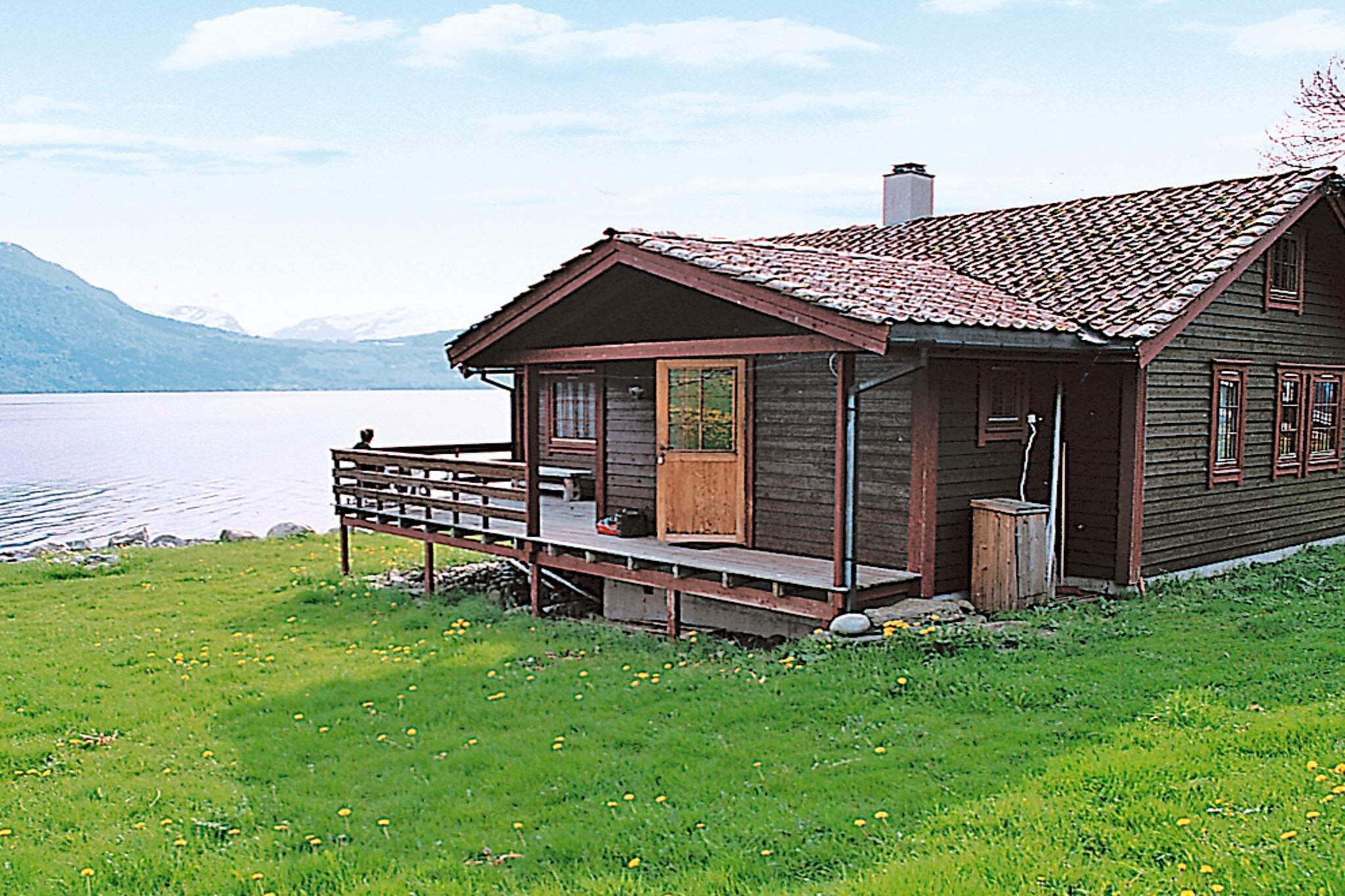 Are you looking for something typical Norwegian? Then this spot is the perfect, only 20 meters from the fjord and with magnificent views. Next to a small country road about 10 km east of Lote, you find the secluded town Hennebygda. In May, you can experience the blossoming fruit trees, green hills, blue fjords and white mountains tops. In the middle of this scenery, you find this charming and comfortable holiday cottage. The house faces southward, with a partlycovered terrace, only 20 meters from the fjord. One double bed is 120 cm wide. Below the cottage is a large, private waterfront, suitable for children. Motorboat available for rent between May 1st and October 1st, 5 life jackets included. From the cottage, you have a panoramic view of Nordfjorden.