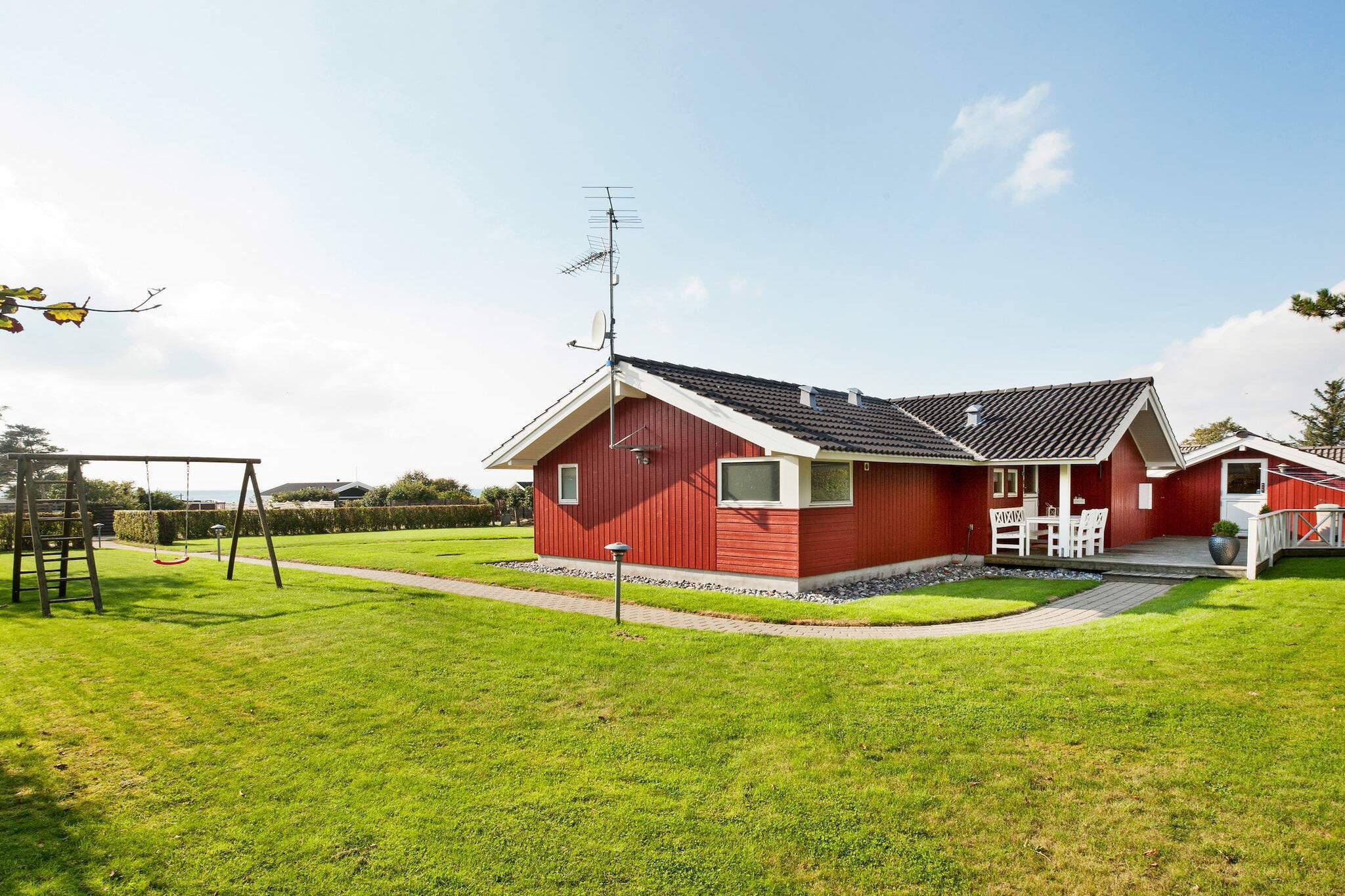 Holiday cottage with modern furnishings located approx. 75 m from the best beach in Kelstrup. The child-friendly house will easily be able to host a great holiday for the family - maybe even two families. Alcove in the living room offers a cosy nook for play and reading. In one of the rooms there is a TV. Likewise, intended for children, there is a swing in the garden with possible supervision from the terrace. Enjoy the view over the Great Belt and the ships passing by. The dishwasher makes the kitchen chores easier. There are 3 bedrooms, a DVD player and a bathroom with a whirlpool and sauna, where you can really relax.A refundable deposit might be charged closer to your check-in date. The security deposit ensures a smooth stay and covers any additional services or consumption charges.This deposit covers utilities consumed during your stay and any additional services that may be taken.The final amount will be adjusted based on actual meter readings, actual usage of extra services, and any remaining balance will be refunded within 21 days after checkout.This deposit simply acts as a prepayment for charges that  you would anyways pay for, ensuring a seamless stay and check-out experience.