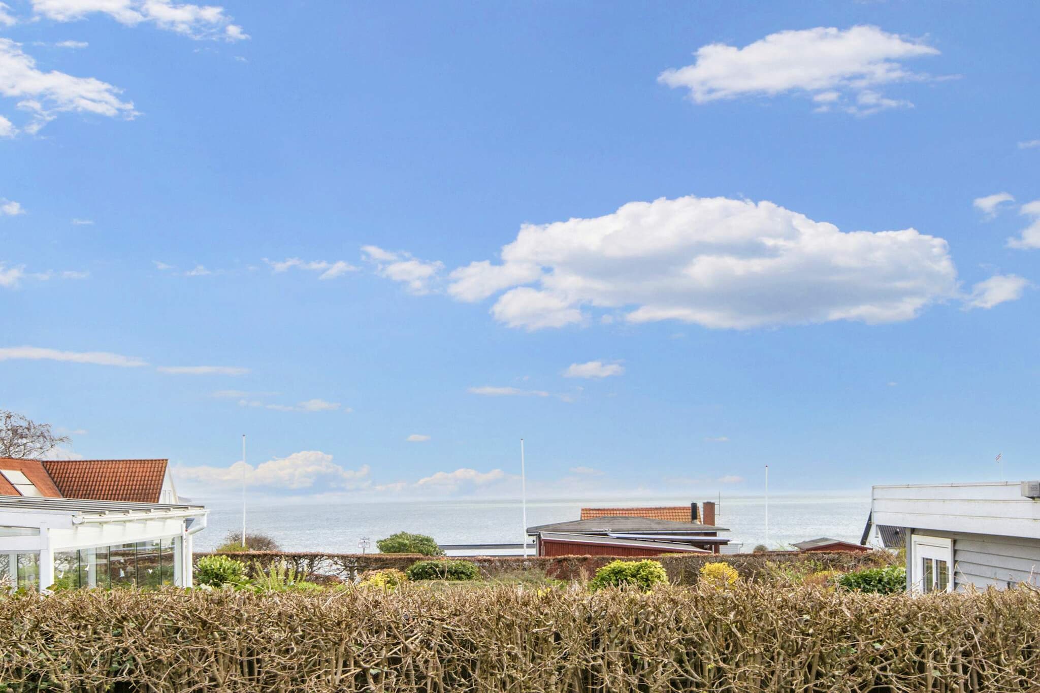 A holiday cottage with whirlpool and sauna and with a  location by a recreational area. There is a nice yard where you can play ballgames. There is also a swing. The house is bright with visible beams in the living room. From here you can access a large terrace. Legoland is within reasonable driving distance and a visit to Fredericia and Vejle is recommended.A refundable deposit might be charged closer to your check-in date. The security deposit ensures a smooth stay and covers any additional services or consumption charges.This deposit covers utilities consumed during your stay and any additional services that may be taken.The final amount will be adjusted based on actual meter readings, actual usage of extra services, and any remaining balance will be refunded within 21 days after checkout.This deposit simply acts as a prepayment for charges that  you would anyways pay for, ensuring a seamless stay and check-out experience.