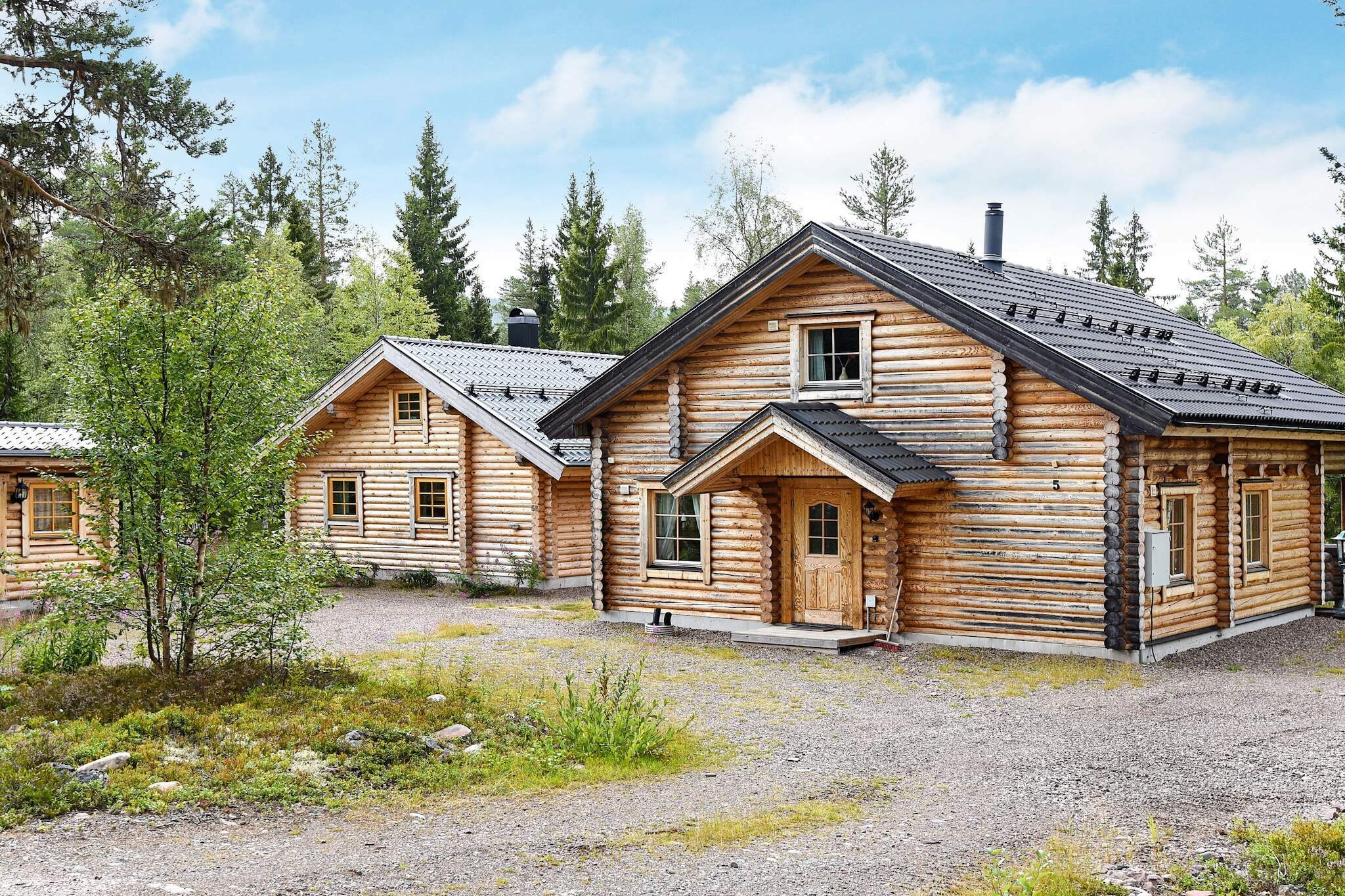 This spacious holiday home, located by the stream SaldalsbÃ¤cken, by the fell HundfjÃ¤llet, is perfect for nature lovers who want to stay in a peaceful environment. The interior of the log cabin is light and airy, and tastefully decorated. There are three bedrooms, one of which is a mezzanine on the second floor. There cabin has a roofed terrace as well as a balcony. There's also a sauna. In the charming kitchen, you will find all of the necessary amenities, including a dishwasher. The well-equipped bathroom has underfloor heating features a WC, a washbasin, a shower cubicle and a sauna. In the bathroom you will also find a washing machine and a dryer. The cabin has a TV with Scandinavian channels. The cabin is set on a beautiful, natural plot and is only thirty metres from the river, where fishing is allowed. The closest bathing spot is four kilometres away, and the grocery store is only two  kilometres away. You can buy your fishing permit at the ICA grocery store or the sports shop in RÃ¶rbÃ¤cksnÃ¤s. There are plenty of lovely hiking paths in the area. The neighbouring cottage, no. 38735 can also be rented.  From 2026, guests can conveniently charge their electric car at this cottage, with simple payment via the app. Welcome to a lovely holiday home! Youth groups are not allowed to rent this house!