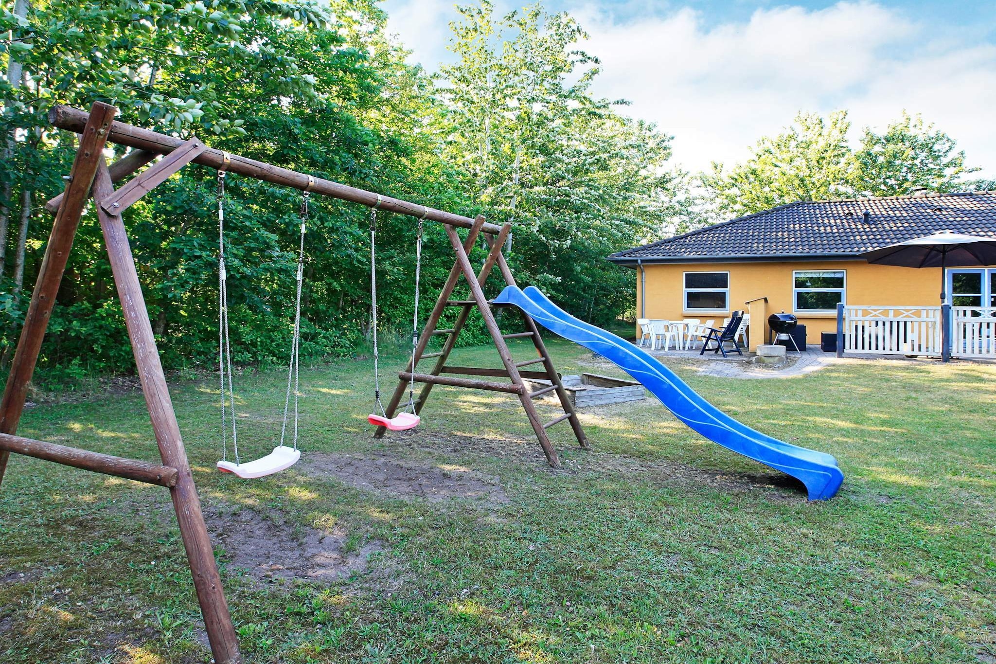 Internet Access DSL, open kitchen(cooker(electric), hood, coffee machine, microwave, dishwasher, fridge(+ freezer), freezer(60-99L), tumble dryer, washing machine), Living/bed room(TV(satellite, german television channels, danish TV channels (DR1 and TV2)), DVD player, CD player, stereo unit, high chair), bedroom(double bed, cot), bedroom(2x single bed), bedroom(2x single bed), bedroom(2x single bed), bedroom(2x single bed), bedroom(2x single bed), bathroom(floor heating)(bathtub or shower, washbasin, toilet), bathroom(floor heating)(washbasin, shower, toilet), game computer, Bubble bath(indoor, 2 persons), sauna(indoor, heated, 4 persons), heating(central), terrace, BBQ, play equipment, table football, air hockey, air to air heatpump