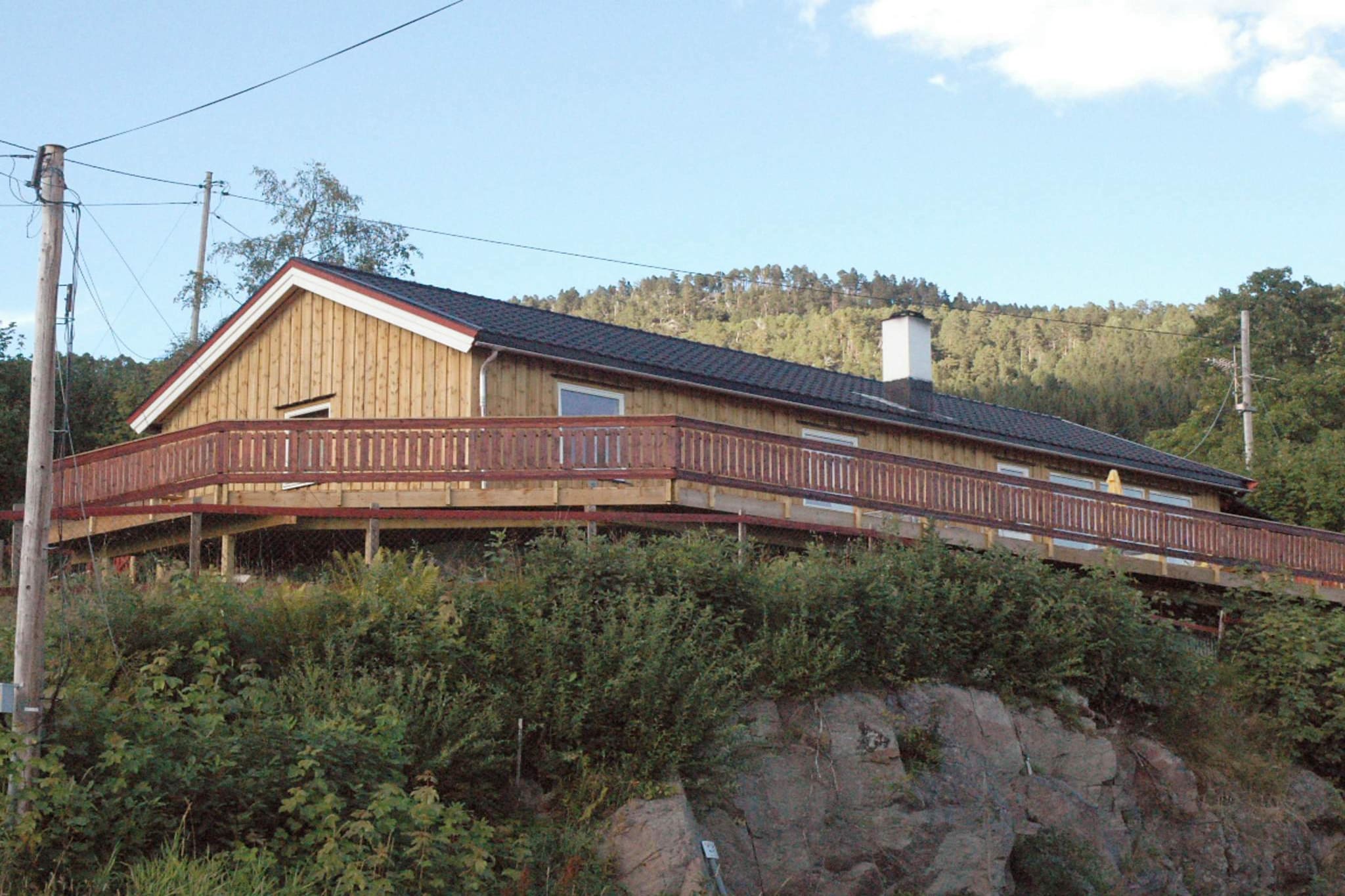 A holiday house located on a hillside, with a view of the fish-rich   Skalvikfjorden just below the house. Relax in the wood-fueled bath   barrel that fits 6 people, and where the water takes 4-6 hours to heat   up. The house is well equipped and has plenty of kitchen equipment, a   stereo with a surround system, etc. The double bed has a 220x180 cm   mattress of top quality. There is a motorboat available for rent by the   fjord. To bring your own boat is not permitted. Life jackets and fish  cleaning table included. Go fishing for  salmon and trout in the famous  river of Surna, 36 km away. The lake of  Lillevatnet has trout, 7 km  away. You can borrow a modest cottage from  the owner, located at an  altitude of approx. 500 meters, 25-30 minutes  walking from your house.  This small cottage is next to a lake with trout  of 200-500 grams, and  you can rent a motorboat from the owner. Back at your main holiday  house, you can explore the many sights of the area by car - visit  Trondheim, Kristiansund, the Atlantic Road, Molde, etc.