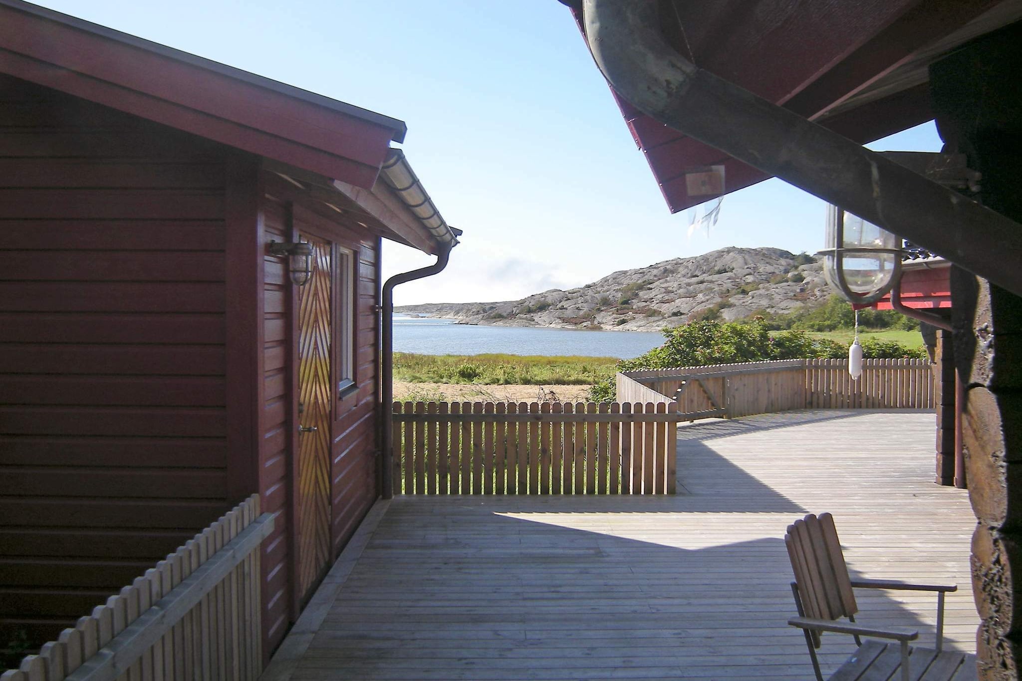 A truly unique and newly renovated holiday home, build in timber and located on its own beachfront property. The beachfront is on 11 hectares and is on the outskirts of the charming fishing community HÃ¤lleviksstrand. Enjoy the untouched setting with the lovely panoramic view and overlook the shifting ocean. The holiday home consists of a main building on 55 mÂ² and two annex (10 mÂ² and 12m2). There is very easy to relax here during all of the seasons. Enjoy the great atmosphere and the untouched nature on the large patio or around the warm wood burning stove during the cold evenings. This holiday home has a bright and modern decoration. The main building is made of a sunken dining area, a modern kitchen, a large living room equipped with a TV and around 30 different Swedish and English channels, two bedrooms (one of the bedrooms has access to the nice shower cabin) and a separate WC with washbasin. There are two extra beds which consist of a sofa bed in the living room. The two annexes have two beds each, and offer an amazing ocean view. You can take a swim in the private bay from the bridge which is part of the property and is approximately 300m away. There is also here where the boat is docked which is at your disposal. The boat is available during the weeks 20-40. The local beach offers both sand and rock beach, bridge and are about 750m away. There is approximately 7km to EllÃ¶s.  Good to know: Simpler experience and knowledge of charts and/or plotters/gps is required if you want to rent the motorboat. Cost: SEK 1000 per week. Payment to the owner on site.