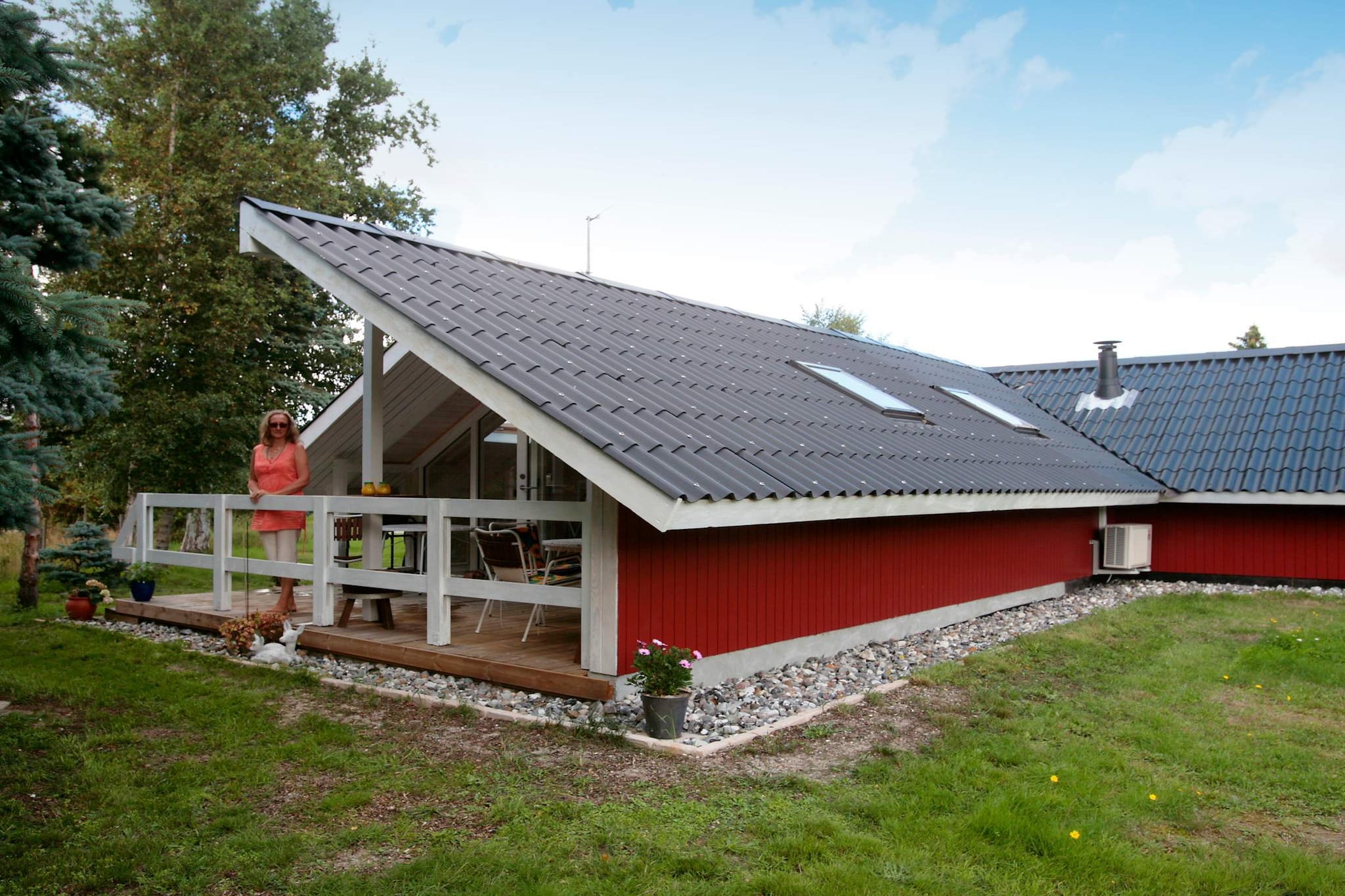 open kitchen(cooker(electric), hood, coffee machine, microwave, dishwasher, fridge(+ freezer), washing machine), Living/bed room(TV(satellite, german television channels, danish TV channels (DR1 and TV2)), DVD player, CD player, stereo unit, high chair), bedroom(double bed, cot), bedroom(double bed), bedroom(2x single bed), bedroom(single bed), bathroom(floor heating)(bathtub or shower, washbasin, toilet), bath tub(outside), heating(electric), terrace, BBQ, play equipment, air to air heatpump