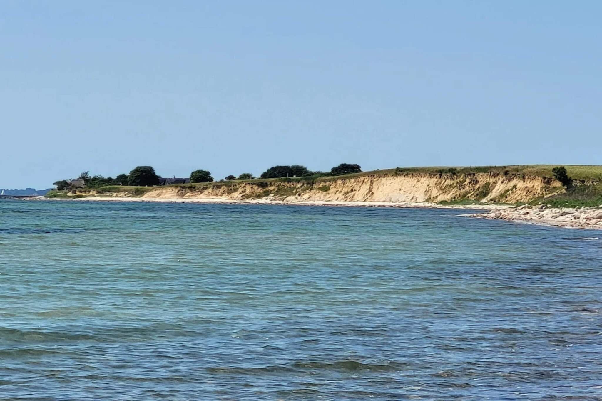 Luxe villa met zwembad aan zee - Waterzicht