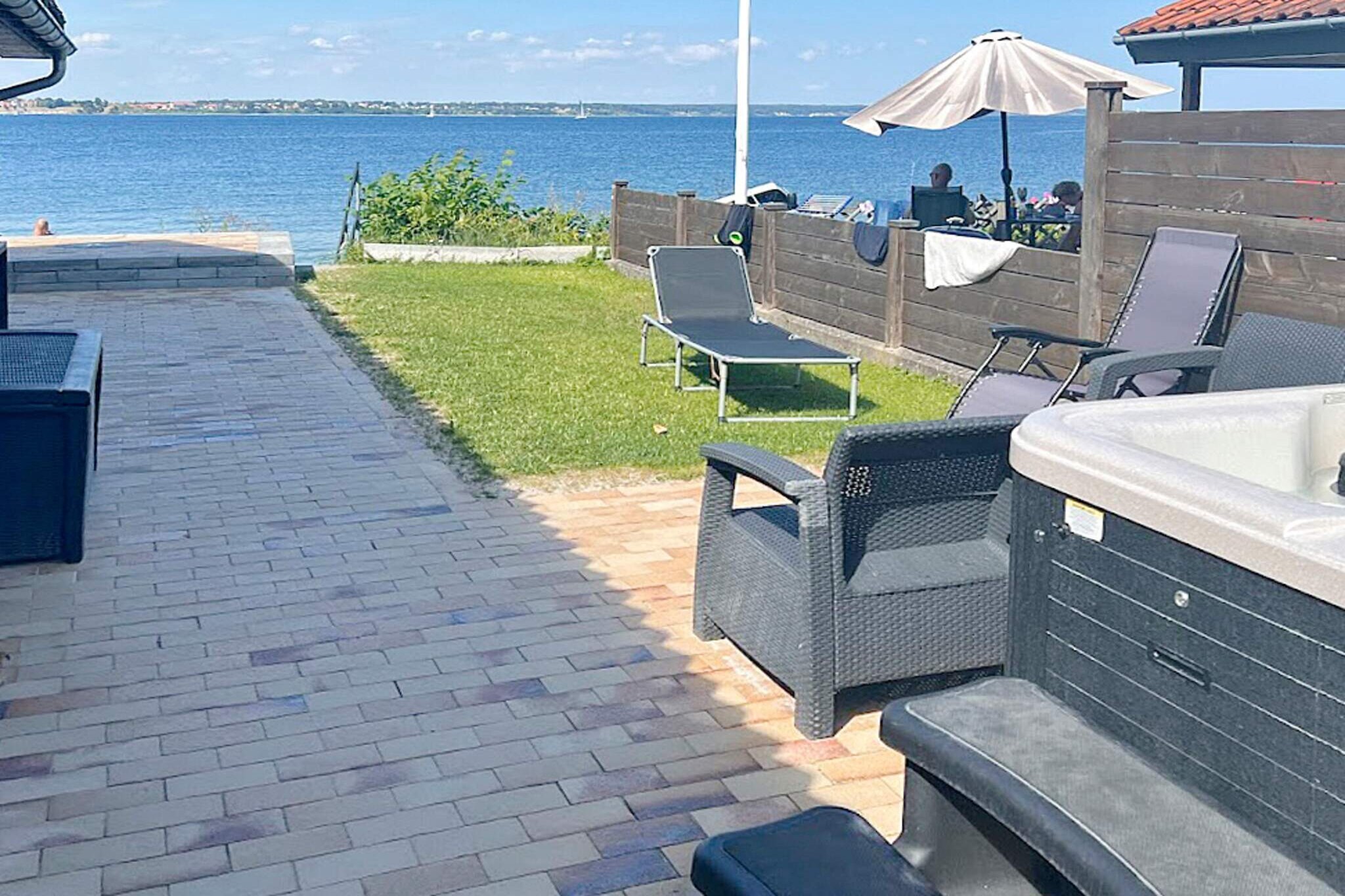 Internet Access DSL, open kitchen(cooker(electric), hood, coffee machine, microwave, dishwasher, fridge-freezer, tumble dryer, washing machine), Living/bed room(TV(cable, german television channels), DVD player, CD player, stereo unit, high chair), bedroom(double bed, cot), bedroom(double bed), bathroom(Steam bath, washbasin, shower, toilet), bathroom(washbasin, toilet), bathroom(bathtub or shower, washbasin), Bubble bath(outside, heated, 4 persons), Bubble bath(indoor, 2 persons), heating(electric), terrace, terrace(roofed), air to air heatpump