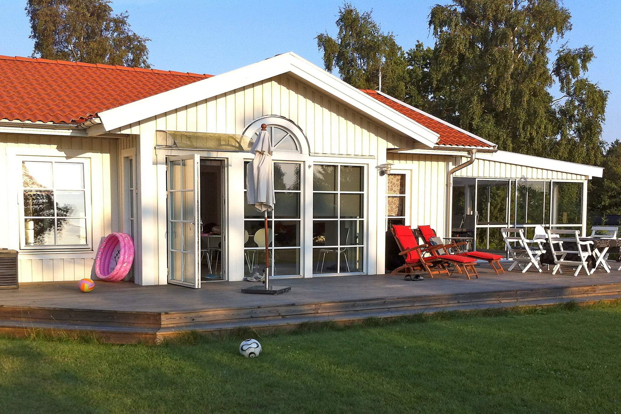 This lovely holiday home is set in Sandvik, outside of Ronneby. It is set on an elevated plot and offers a panoramic view of the sea, which you can admire from the large terrace. The beach is only a few minutes away and there are fishing opportunities.  The house features two bedrooms, one with a comfortable double bed, the other with two single beds. The kitchen and living room are open plan. In the living room you will find a TV with satellite channels. The kitchen features a fridge and freezer, a cooker hood, a microwave oven, a coffee maker, and a dishwasher. The bathroom has underfloor heating and features a WC, a washbasin, a shower, and a washing machine.  If you wish to explore the area there are plenty of places to see. Why not visit Kuggeboda berth, or the town of Karlskrona with it's interesting sea museum. You can also catch a ferry to the island AspÃ¶. free of charge. Or take the car and drive over to the islands of SturkÃ¶ and TjurkÃ¶. If you enjoy golfing you mustn't miss the beautiful golf course in Ronnebybrunn. On the other side of Karlskrona you will find Barnens GÃ¥rd and a waterpark, a perfect place for children!  Please note: Household waste must be source separated for recycling.  Welcome to Sandvik!