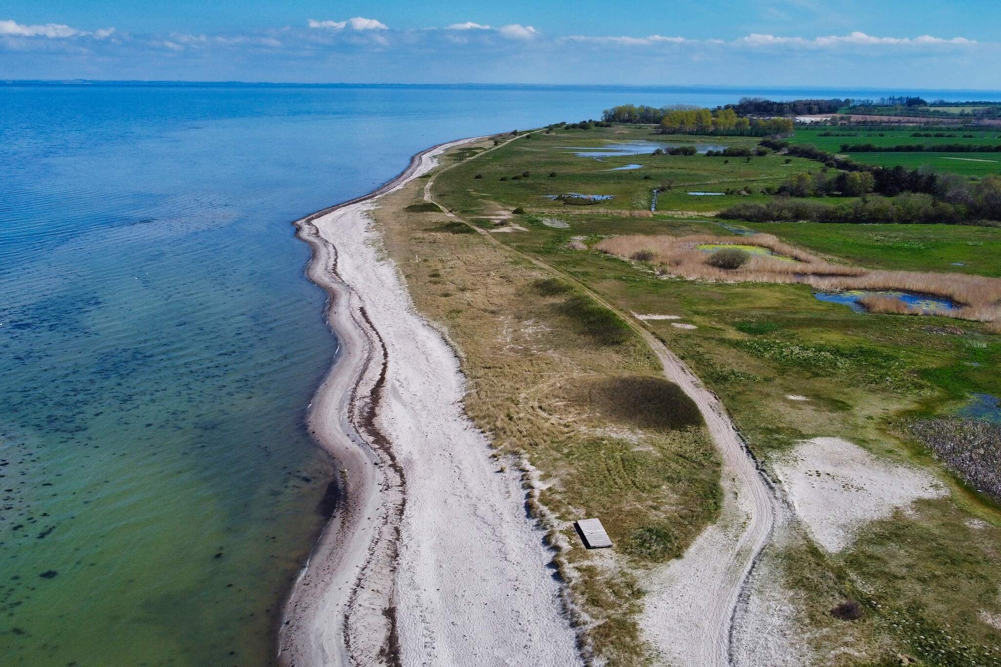 Luxe zwembadresort in Nordborg - Waterzicht