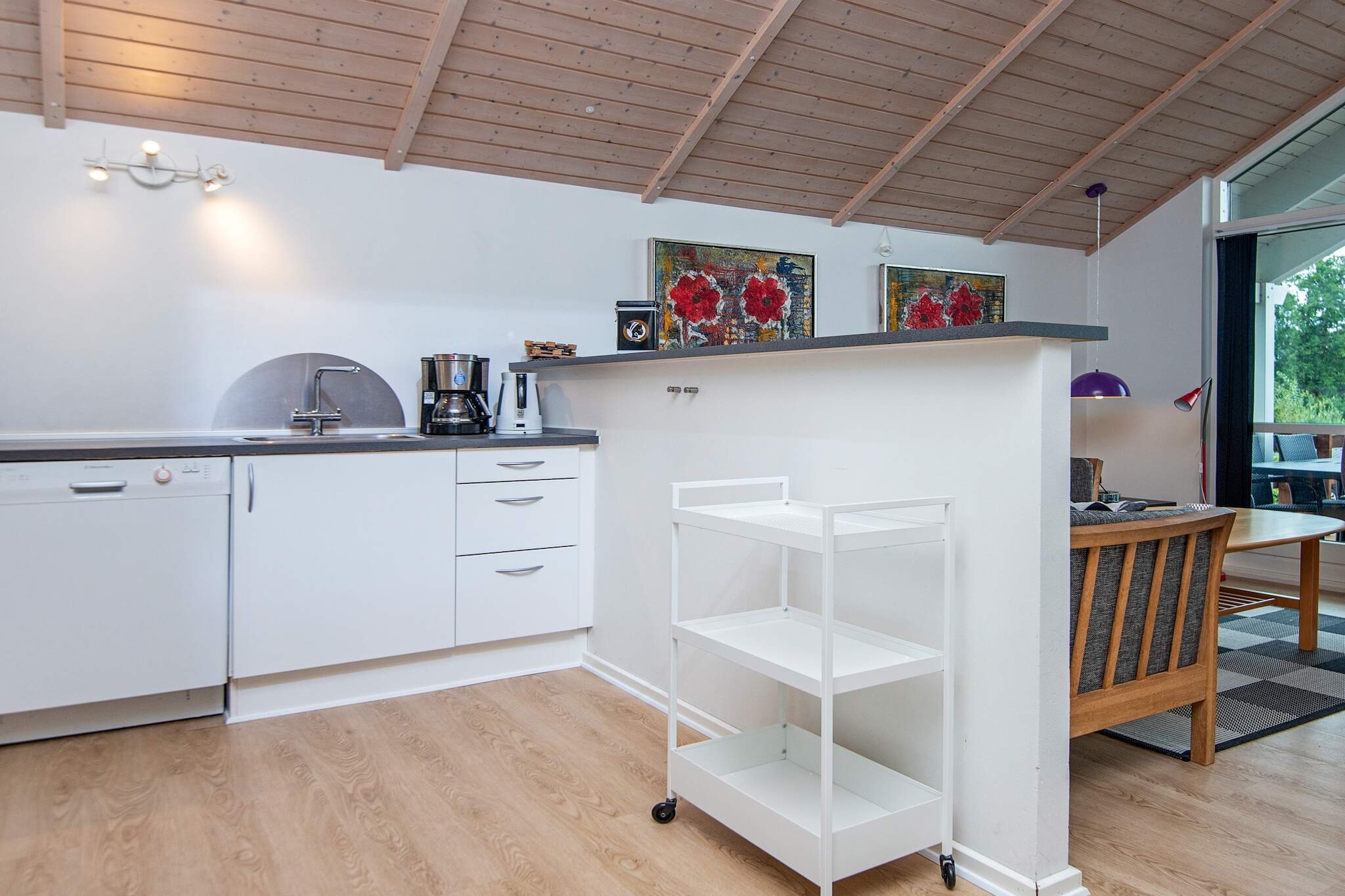 open kitchen(cooker(electric), hood, coffee machine, dishwasher, fridge, freezer(1-59L), tumble dryer, washing machine), Living/bed room(TV(cable, german television channels, danish TV channels (DR1 and TV2)), CD player, stereo unit, high chair), bedroom(double bed, children\'s bed), bedroom(2x single bed), bedroom(double folding bed), bathroom(floor heating)(bathtub or shower, washbasin, toilet), bathroom(floor heating)(washbasin, toilet), mezzanine(2x single folding bed), Bubble bath(indoor, heated, 2 persons), heating(electric), terrace, garden, BBQ, play equipment, air to air heatpump