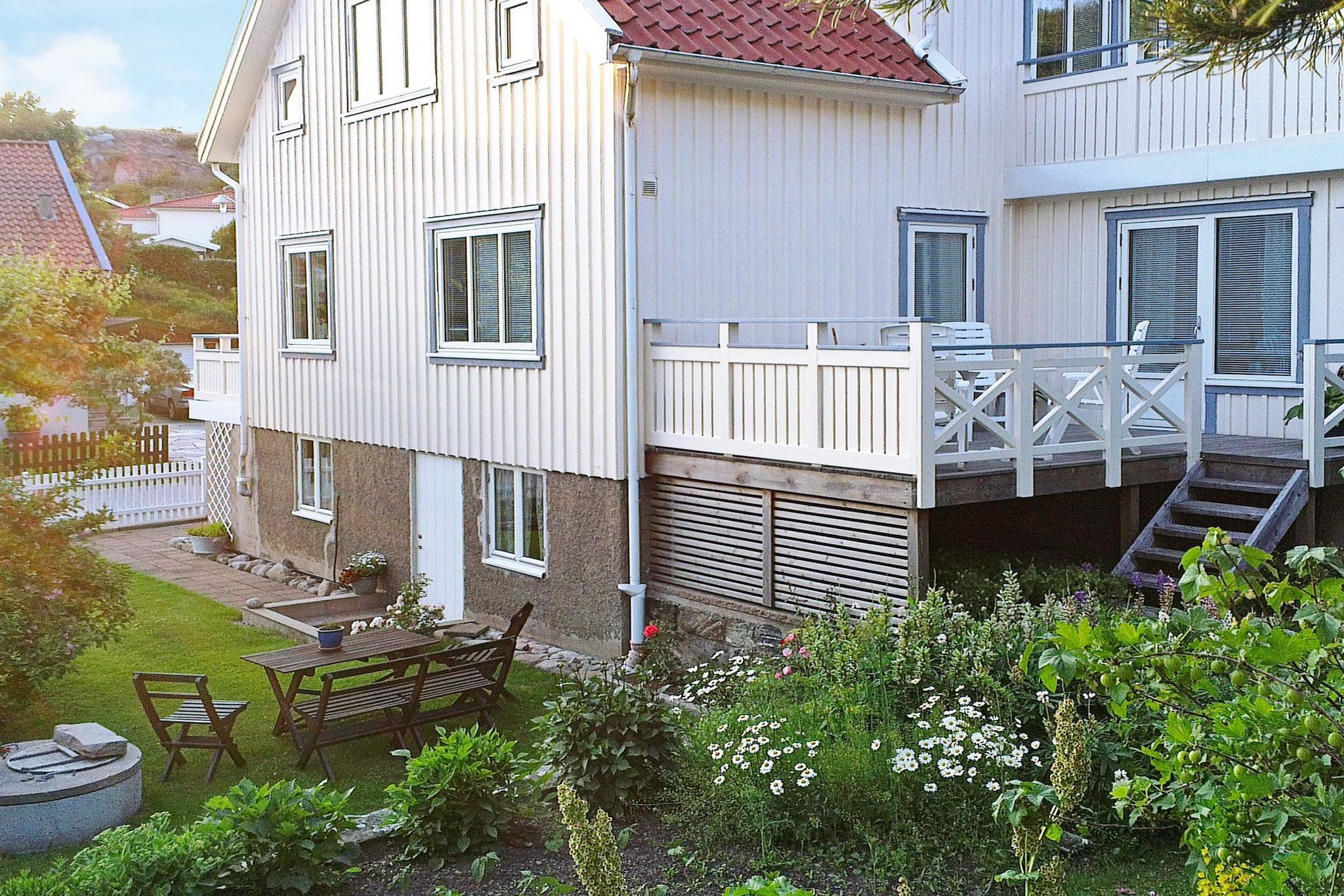 On the magnificent island of TjÃ¶rn, you will find this modern holiday home with a view of the sea. The holiday home is a flat on the upper floor of a house that is set in a quiet residential area in the centre of SkÃ¤rhamn.  The flat has two furnished balconies from which you can admire the archipelago. You will also have use of a private part of the landlord's garden and an outdoor sitting area. The flat features two comfortable bedrooms. In one you will find a double bed and in the other there are two single beds. The spacious living room features a TV-area, a DVD-player, and free wireless internet access. The kitchen is light and airy and opens onto the smaller balcony. The bathroom features a WC, a washbasin, and a shower. . You also have access to a washing machine which you share with the landlord. You will find it in the basement. You enter the flat through the landlord's hall. Your flat is upstairs and you have a front door upstairs that you can lock. The lovely, child-friendly beach of Tubbeviken is just 200 metres from your flat. This is a lovely place for the whole family, there's a bathing dock and cliffs, as well as a sandy beach where the children can play and fish for crabs. SkÃ¤rhamn offers plenty of entertainment and culture, for instance lovely art museum specialising in aquarelles. Your holiday home is within walkin distance of most services, such as restaurants, shops and grocery stores. Why not visit the lovely towns in the archipelago? KlÃ¤desholmen and Kyrkesund to mention a couple.Within a wider distance, you will find RÃ¶nnÃ¤ng dock, where you can dine or catch a ferry to the islands of Ã…stol, TjÃ¶rnekalv and DyrÃ¶n. Gothenburg, Swedens second largest city, is only 65 kilometres away! Welcome to this perfectly situated holiday home!