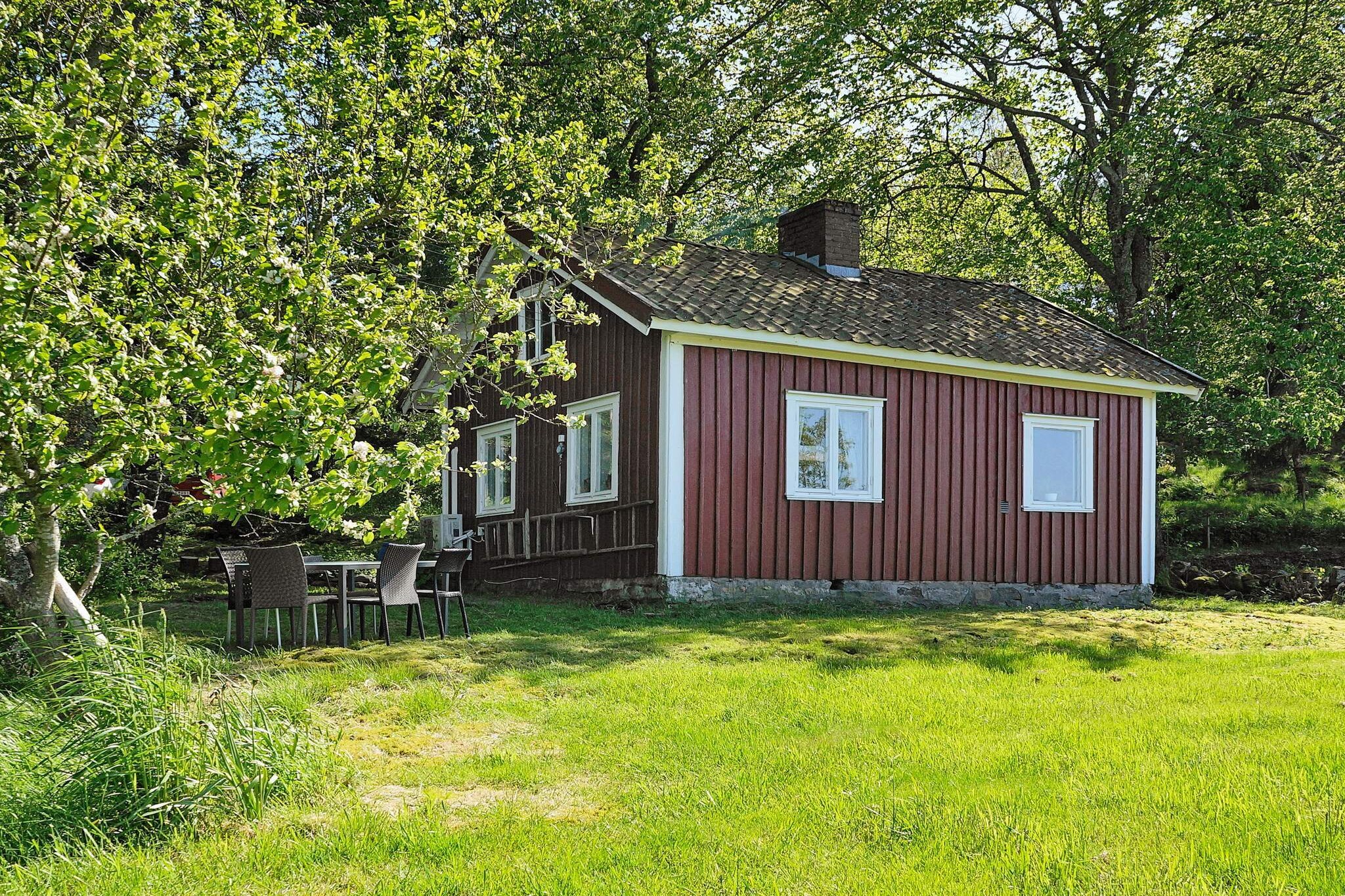 This charming holiday home is set in the countryside north of KungÃ¤lv. It offers a stunning view of the fjord and the fields that surround it. Relax on the terrace while watching the boats passing by and the cows grazing on the pastures. The garden has a big lawn where the children can play. The cottage is rustic and features visible beams. In the cosy kitchen you will find a wood burning stove and a dining area. The living room features a TV-area and a sofa bed with a width of 140 centimetres, suitable for 1-2 people to sleep in. The bathroom is fully tiled and contains a WC, washbasin, shower, and washing machine. The light and airy bedroom features a comfortable double bed. It's just a few minute's walk from the cottage to the nearest bathing spot with it's cliffs and it's bathing dock. This is where you'll find the boat that you can rent from the landlord. There's another beach called Vadholmen, which you can reach by car, on the other side of the bay. The nearest town is Kode, 5 kilometres away, which has a shop and a pizza place. You can also find a small grocery store in Solberga, 3 kilometres. The area offers plenty of sights, for instance the fortress Bohus fÃ¤stning, and the town of KungÃ¤lv (17 kilometres away), with it's buildings dating back to the 1600's. Marstrand is within driving distance, it is the sailing metropolis of Sweden! This is a favourite resort for the Swedish royalty and you will find an old fortress here. Or visit the nature reserve in Svartdalen with it's beautiful lakes, excellent for swimming. Gothenburg is only 40 km away, here you can visit the popular amusement park Liseberg or Universeum. Welcome to a charming holiday home on the beautiful west coast!