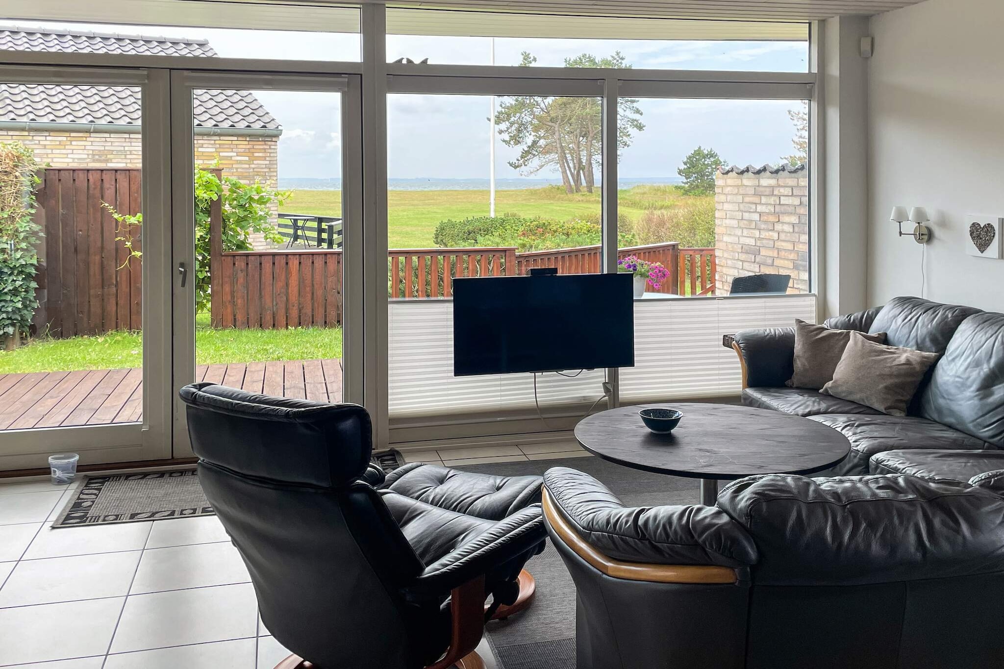 Vakantiehuis aan zee met sauna - Waterzicht