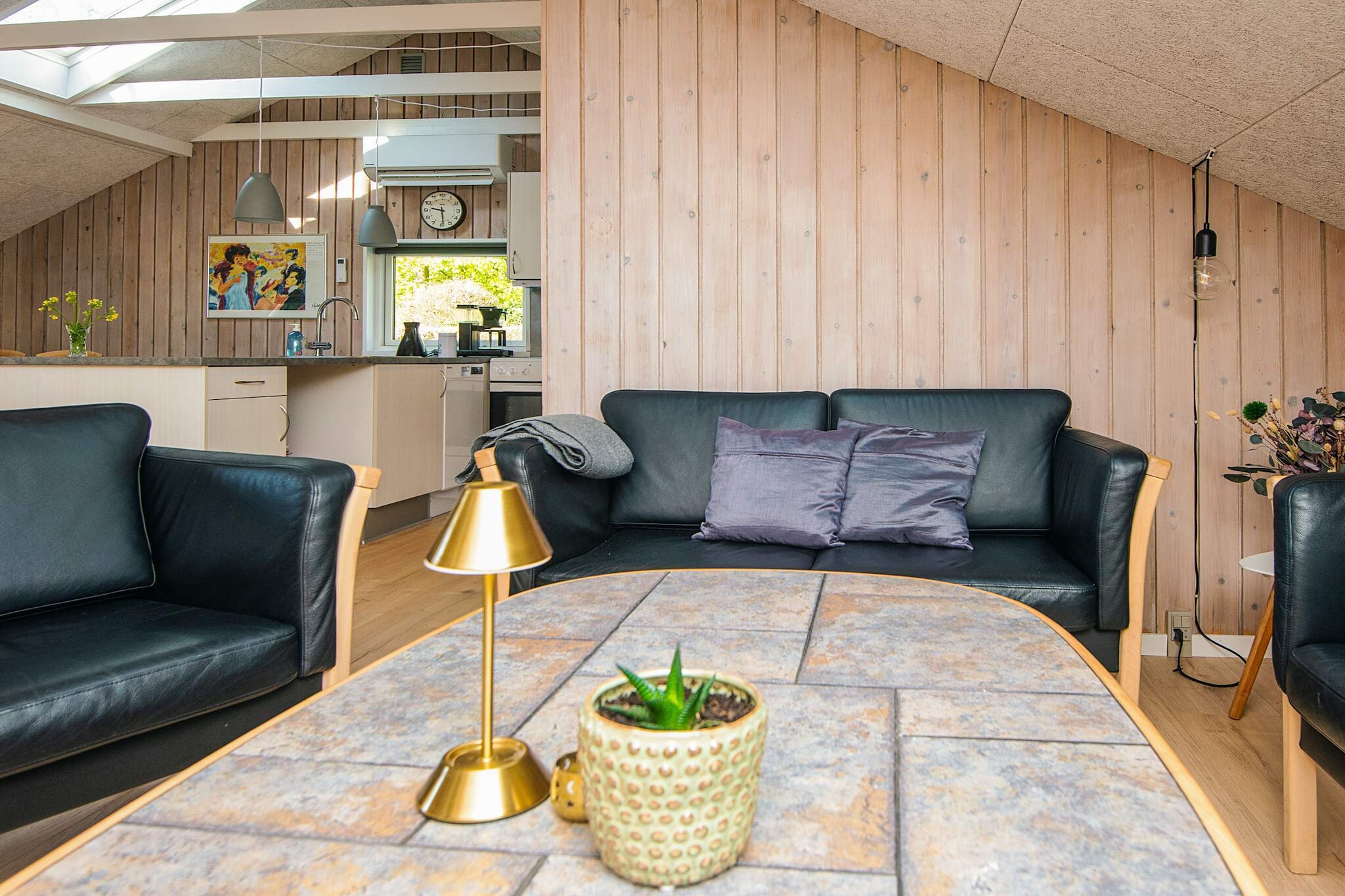 Familiehuisje met terras en gazon