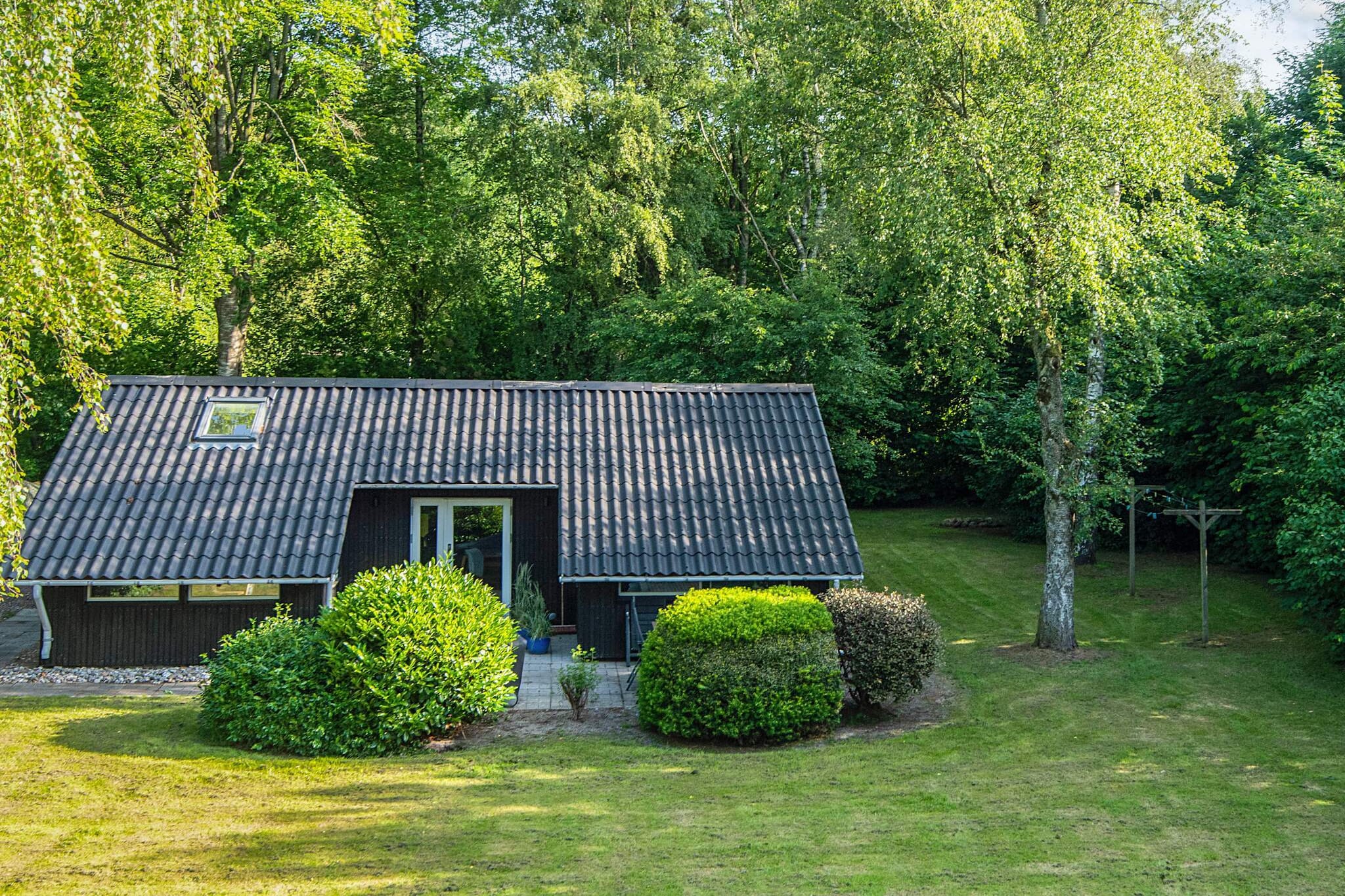 Familiehuisje met terras en gazon - Uitzicht