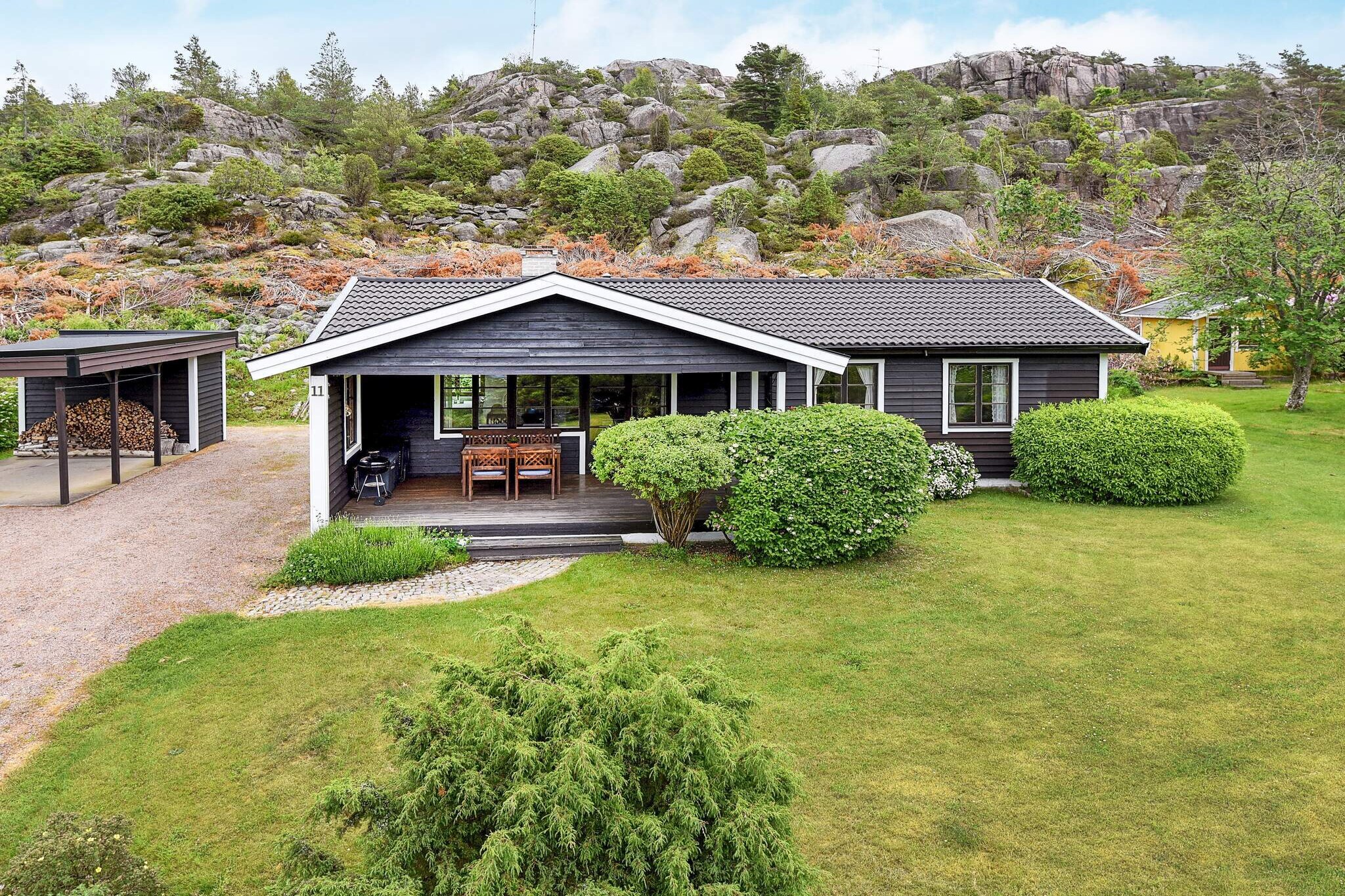 Welcome to this lovely holiday home, set near the sea, outside of Bovallstrand. This spacious house has enough room for two families. It has a beautiful outdoor sitting area and a nice garden where the children can play. The house features a well-equipped kitchen and a living room with a fireplace, an extra bed, a TV (with the Swedish channels 1 and 2), and a DVD-player. The living room opens onto the lovely terrace. Two of the bedrooms have double beds, the third bedroom is equipped with two single beds. The bathroom features a WC, a washbasin, a shower, and a washing machine. The cottage is set only 300 metres from from the sea and the lovely fjord Bottnafjorden. If you want to rent a docking place for a boat, you can rent one from the landlord for the price of 500 SEK/week. The popular bathing spot at Badholmarna is only 2.5 kilometres away, with sandy beaches, cliffs, trampolines, and bathing docks. The lovely, 70-kilometre-long walking path Soteleden is also nearby. If you are interested in history then you have come to the right place! BohuslÃ¤n has been populated since the stone ages and there are many interesting ancient remains here, stone carvings, ancient grave fields and a stone circle. BohuslÃ¤n is thought to be the home of Beowulf from the epic poem. Welcome to beautiful BohuslÃ¤n!