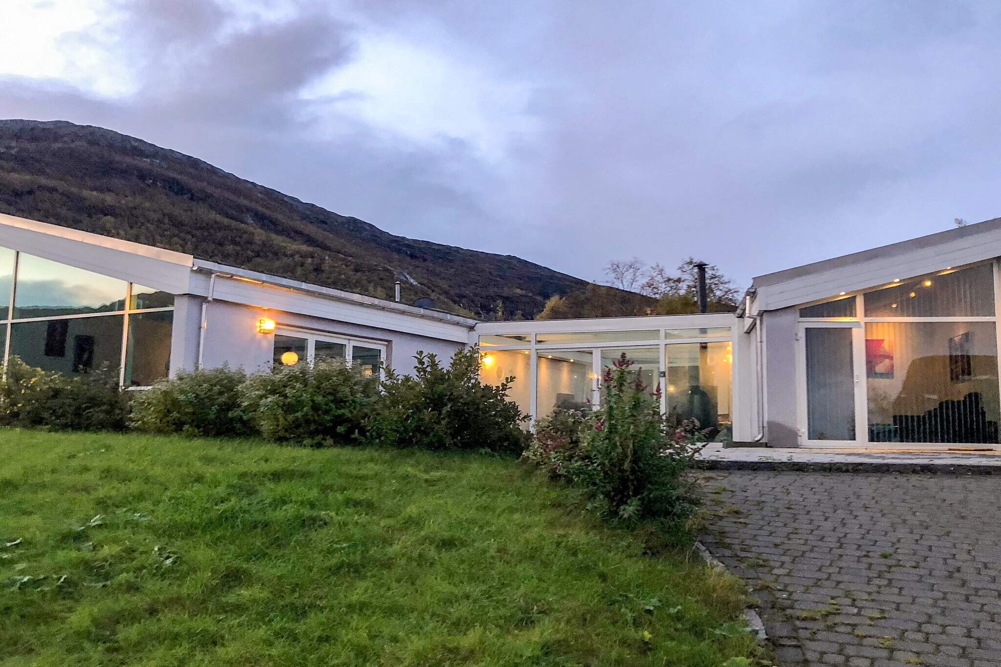 open kitchen(cooker(electric), hood, coffee machine(filter), microwave, dishwasher, fridge, freezer(200-249L), washing machine, high chair), Living/bed room(38 m2)(TV(satellite, german television channels, norvegian TV channels ), DVD player, radio, stereo unit), Living/bed room(12 m2)(double folding bed), bedroom(7 m2)(double bed, children\'s bed), bedroom(6 m2)(double bed, bunk bed), bedroom(11 m2)(double bed, bunk bed), bathroom(floor heating)(bathtub or shower, washbasin, toilet), bathroom(floor heating)(bathtub or shower, washbasin, toilet), conservatory(30 m2), Bubble bath(indoor, heated, 6 persons), balcony or terrace(150 m2), heating(electric), garden, garden furniture, BBQ, fish cleaning table, air to air heatpump