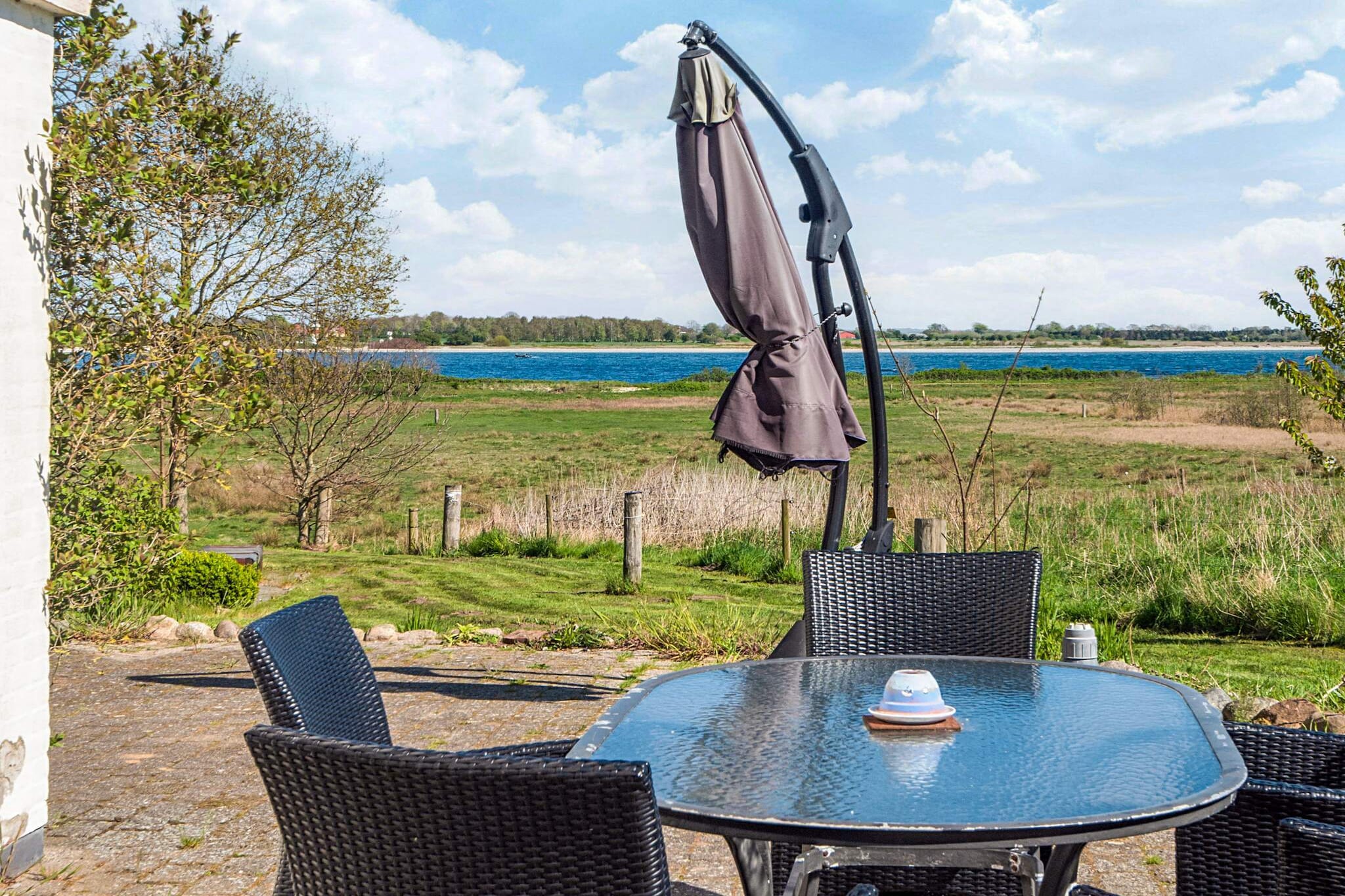 Internet Access DSL, open kitchen(cooker(electric), hood, coffee machine, microwave, dishwasher, freezer(> 250L), fridge-freezer, tumble dryer, washing machine), Living/bed room(TV(satellite), DVD player, CD player, stereo unit), bedroom(double bed, cot), bedroom(double bed), bedroom(double bed), bedroom(double bed), bedroom(double bed, 2x bunk bed), bedroom(double bed, 2x bunk bed), bedroom(double bed, 2x bunk bed), bedroom(double bed), bedroom(double bed), bathroom(floor heating)(Steam bath, bathtub or shower, washbasin, toilet), bathroom(floor heating)(bathtub or shower, washbasin, toilet), bathroom(bathtub or shower, washbasin, toilet), Bubble bath(indoor, heated, 2 persons), Bubble bath(outside, 8 persons), sauna(indoor, heated, 8 persons), heating(central), terrace, BBQ, play equipment, table football, billiards, geothermal energy