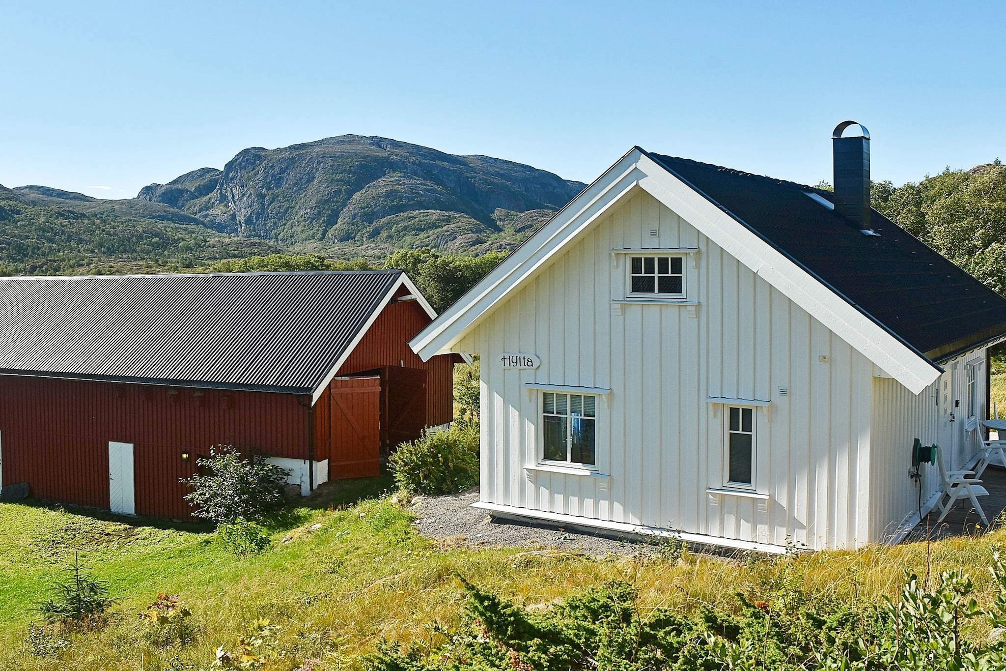 Holiday cottage from 2016 in a rural and family friendly environment. The fjord is within close proximity and there are many hiking trails nearby. This is a bright and charming cottage with an open kitchen and dining section. In the living room there is a wood-burning stove. The ground floor has floor heating in every room. The single beds can be combined into a double bed. On the 40 m² large terrace you can relax after a day of fishing or a hike in the forest. Information for both units 67700 and 67702. On the 70 000 m² large farm, there is a main house and 2 former farm buildings. In the farmyard there is a storage house and barbecue hut (smoking allowed), shared between the two units. There is a swing set and sand box in addition to benches. There is information about what to do in the area. There are many hiking trails with picnic areas. The beach is 1 km away and a lake where you can go swimming is 2 km away. In the farmyard there is a covered fish cleaning table with running water and lighting. The boats are located in a harbour 1 km away. PLease see booking site to book a boat. All boats have filleting boards. Great fishing conditions nearby. There are also several fishing lakes, remember fishing lisence. NB! Request your boat when booking the house. The boats are available for rent for both units. Ask for confirmation from DanCenters local office. The headroom is 180 cm in the middle of the bedrooms. To save space there is a ladder up to the second floor, which makes it unsuitable for people with walking difficulties.