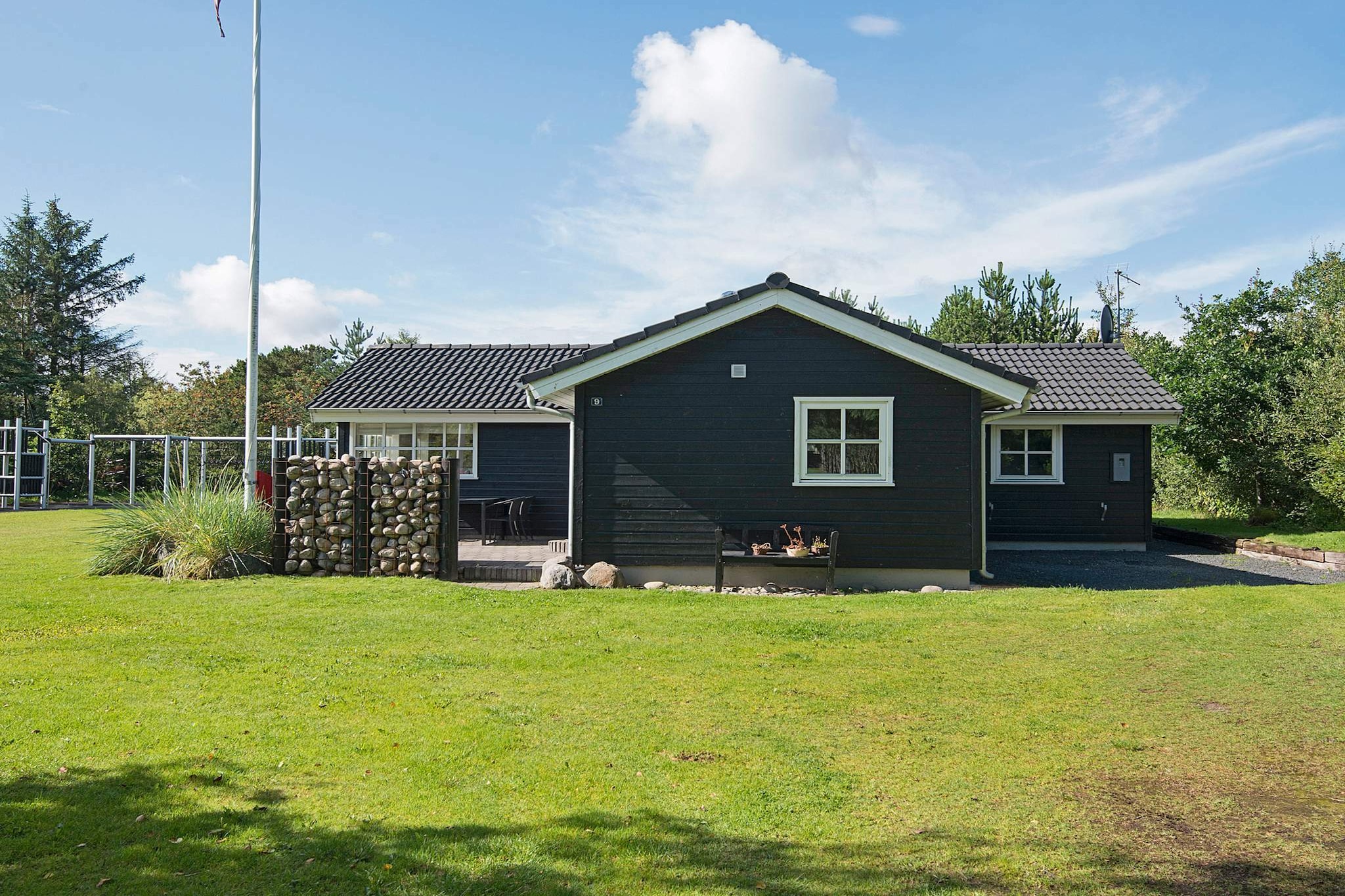 Internet Access DSL, open kitchen(cooker(electric), hood, coffee machine, dishwasher, fridge-freezer, tumble dryer, washing machine), Living/bed room(TV(german television channels, danish TV channels (DR1 and TV2)), DVD player, radio, high chair), bedroom(double bed), bedroom(double bed), bedroom(double bed), bedroom(2x bunk bed), bathroom(floor heating)(bathtub or shower, washbasin, toilet), heating(electric), terrace, BBQ, play equipment, football goal, air to air heatpump