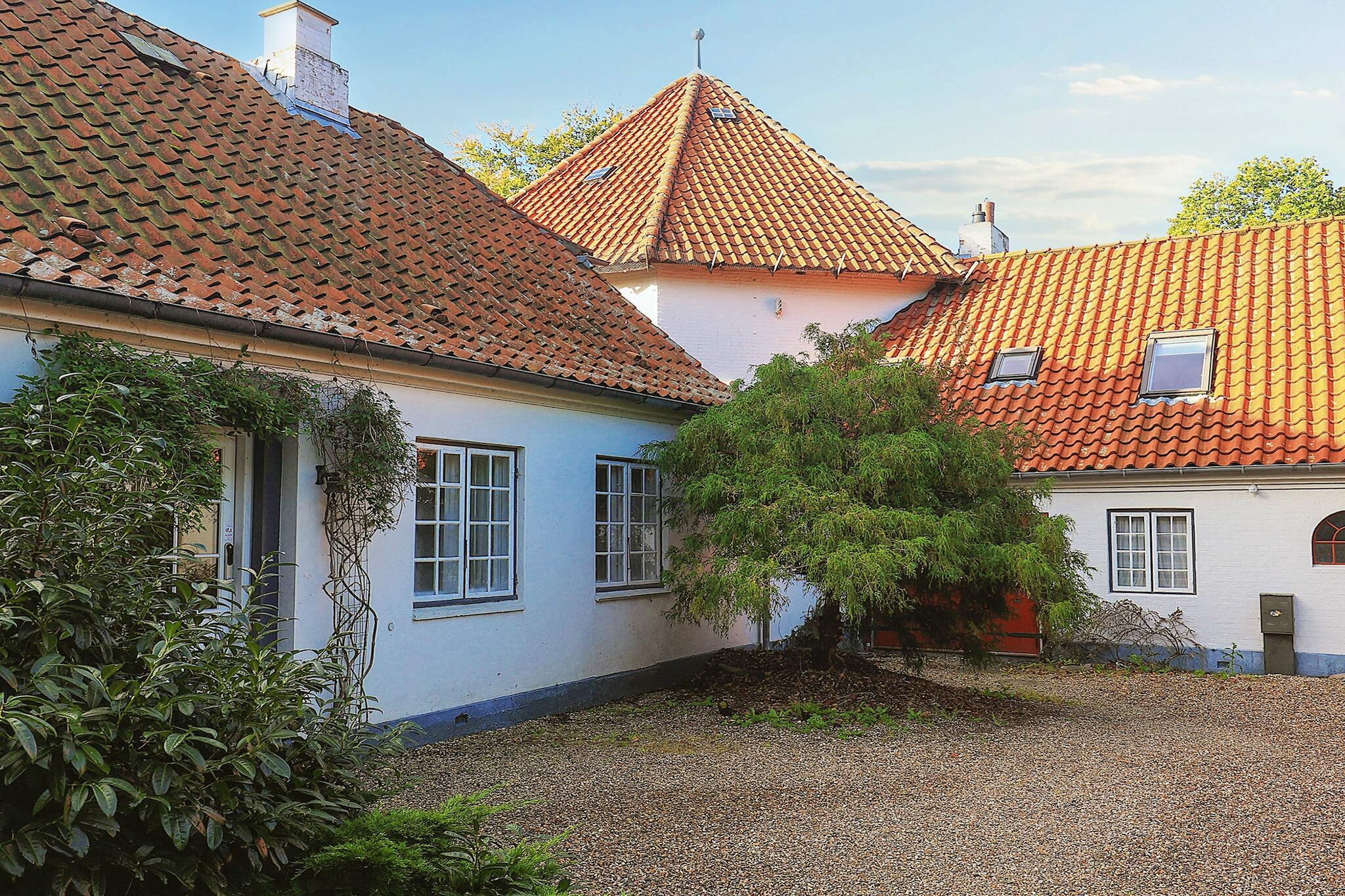This holiday cottage is the old mill that belonged to the manor house of Hindemae. It was Denmark's largest mill when built in 1806. In 2004 the mill was renovated into a holiday cottage where the style of furniture and decor fits the history of the building. The mill is placed in a park-looking garden. The living room on ground floor is like smaller knight's hall with a round shape, where the wood-burning stove is the natural focal point of a relaxing evening. There is table tennis in the garage and a trampoline in the garden (use at your own risk). The outdoor pool section is only 5 metres from the main building. The pool has no cover and is not heated and is open from 1 June - 1 October.A refundable deposit might be charged closer to your check-in date. The security deposit ensures a smooth stay and covers any additional services or consumption charges.This deposit covers utilities consumed during your stay and any additional services that may be taken.The final amount will be adjusted based on actual meter readings, actual usage of extra services, and any remaining balance will be refunded within 21 days after checkout.This deposit simply acts as a prepayment for charges that  you would anyways pay for, ensuring a seamless stay and check-out experience.