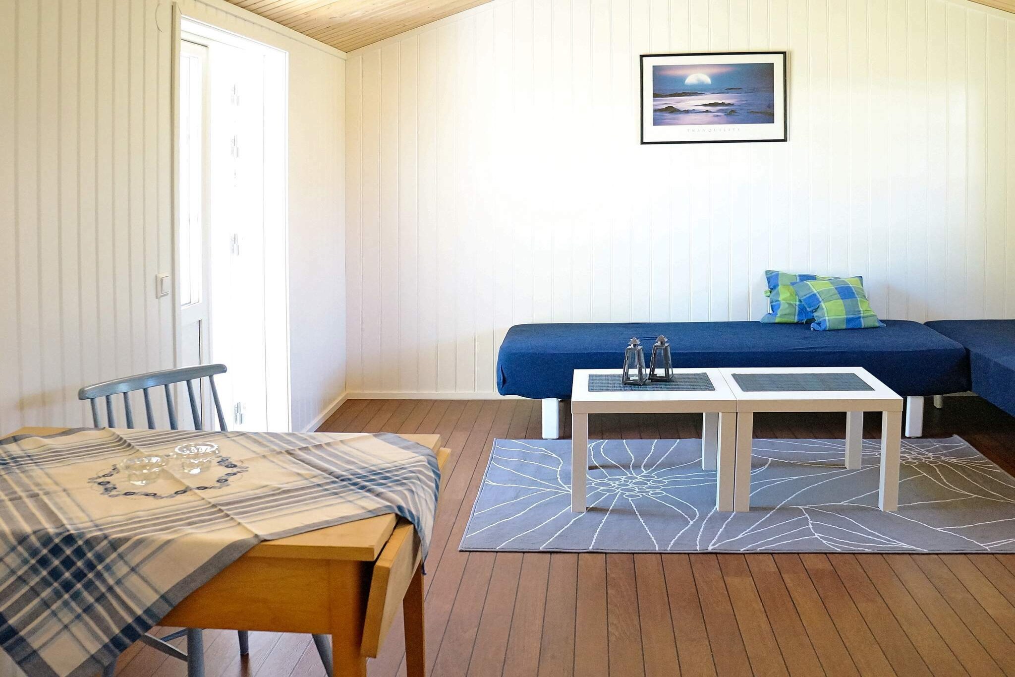 pantry(cooker(2 ring stoves), coffee machine, fridge-freezer), Living/bed room(2x single bed, TV(swedish TV channels), radio), bathroom(washbasin, shower, toilet), heating(electric), terrace(garden furniture, BBQ), water from well