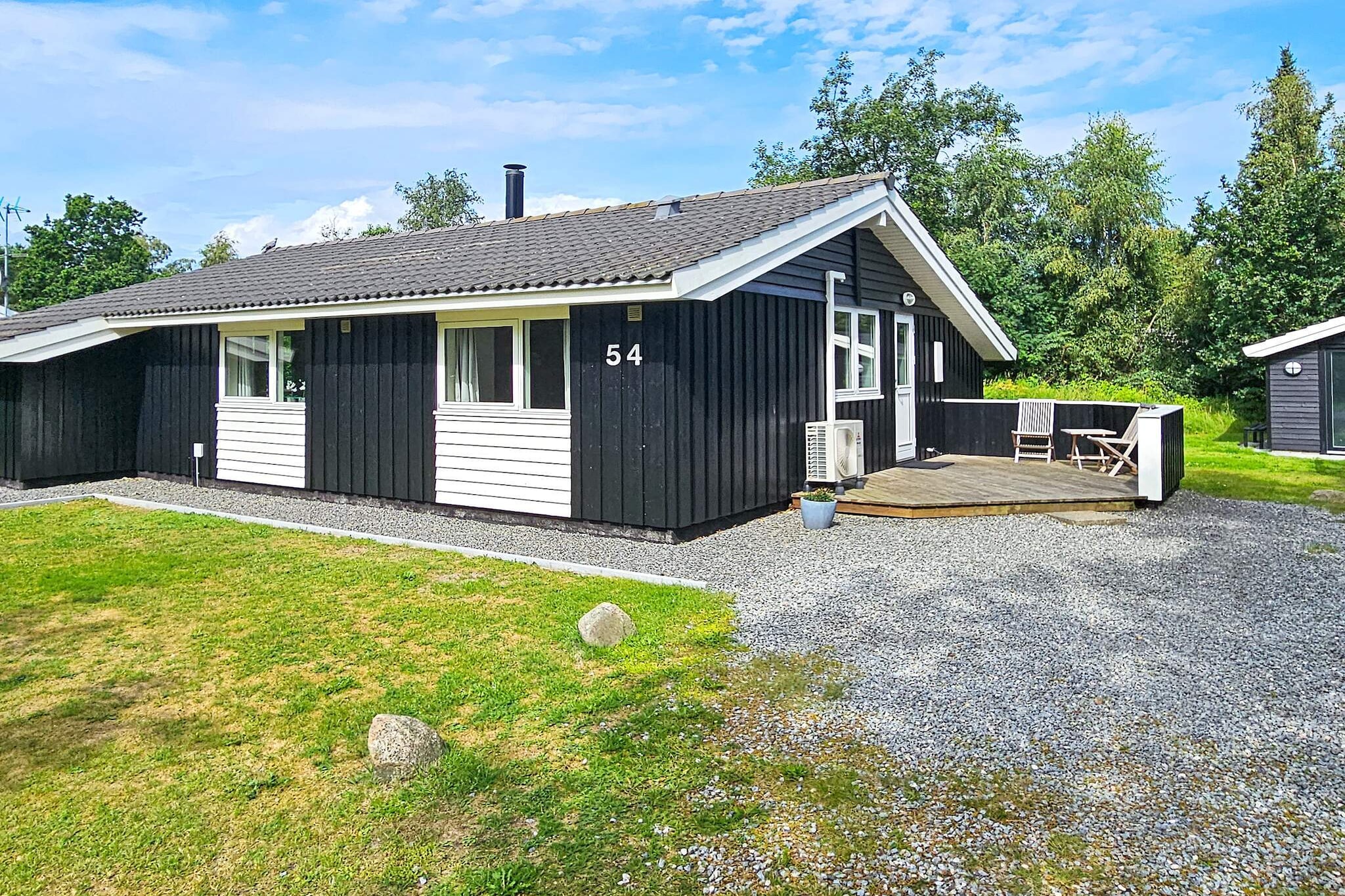 Exciting holiday cottage located on an open natural plot approx. 5 minutes walk from the water. The house is modern furnished with many interesting details. The house includes a living room combined with dining and kitchen area. Decorated with nice bedrooms and good bathroom. The living room opens onto the terrace where barbecues can be enjoyed on warm summer evenings. The large terrace invites for cosy moments, morning, noon and night. No letting to youth groups.