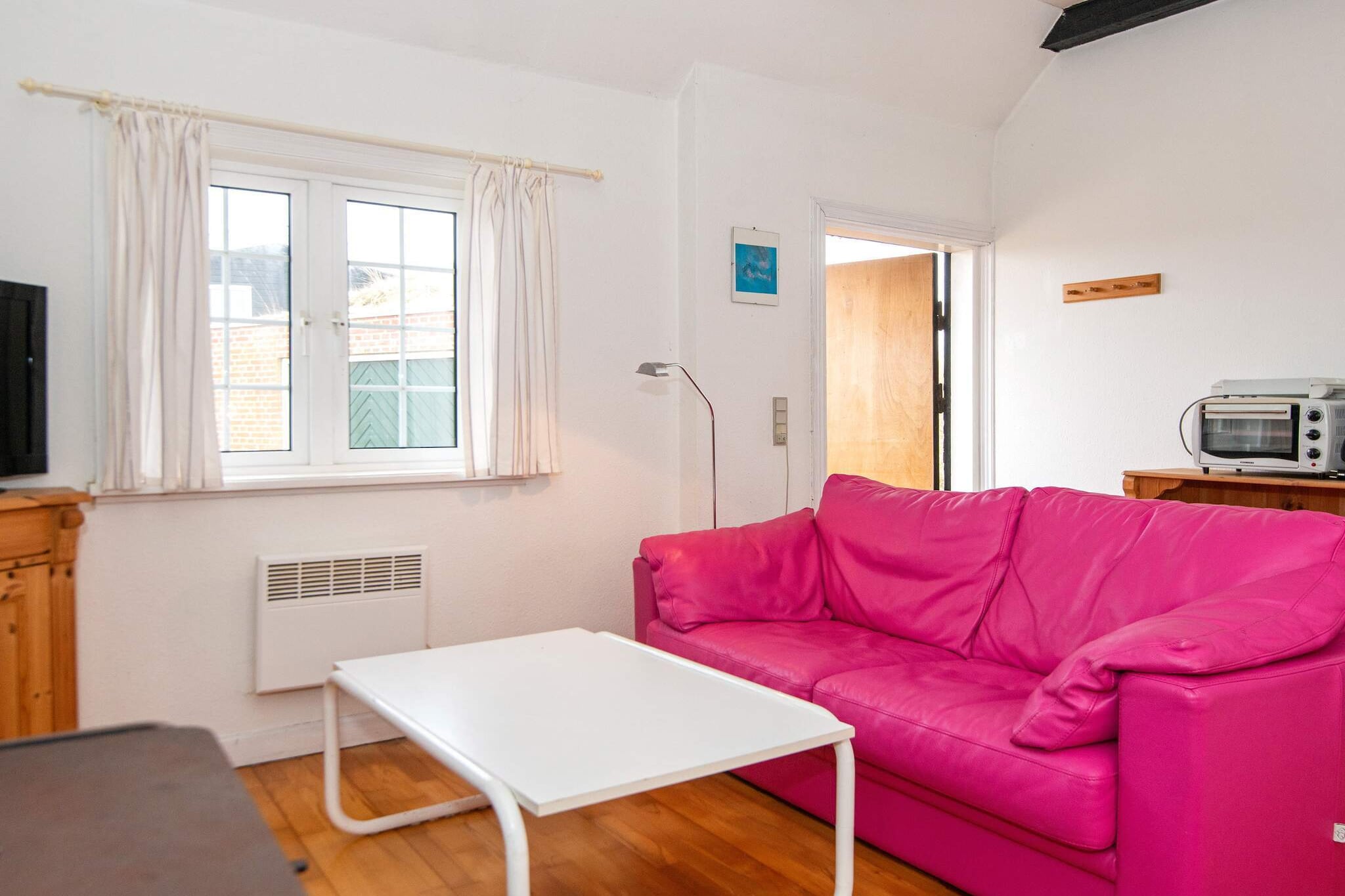 Holiday home located in the first dune row with approx. 100 m to the beach. From the house there is a path directly to the beach. The house is an older, charming cottage and ideal for guests who do not have the high demands for comfort. Bright living room in open connection with a small kitchen. In the living room there is a wood burning stove where you can get warm on a cool evening. Adjacent to the bedroom is the house's bathroom. If you are into golf, there are a few hundred meters to Fanø golf course, which is Denmark's first golf course.
A refundable deposit might be charged closer to your check-in date. This deposit covers utilities consumed during your stay and any additional services that may be taken. The final amount will be adjusted based on actual meter readings, actual usage of extra services, and any remaining balance will be refunded within 21 days after checkout.