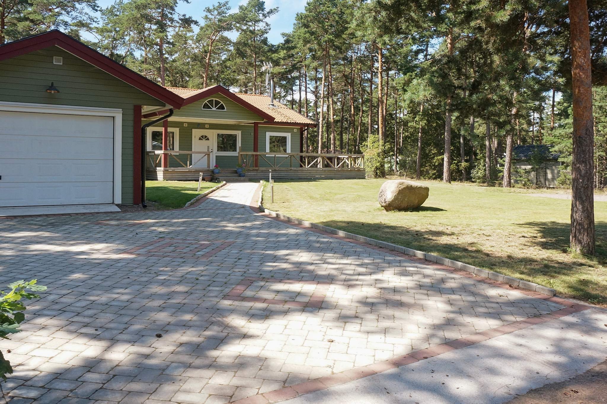 Annex: (2x single bed)\n\nopen kitchen(cooker(electric), coffee machine, microwave, dishwasher, fridge(+ freezer), freezer(100-139L), high chair), Living/bed room(TV(satellite), fireplace, DVD player, radio, CD player, game computer, table football), bedroom(double bed), bedroom(2x single bed), bedroom(2x single bed), bathroom(floor heating)(washbasin, shower, toilet, washing machine), bathroom(washbasin, toilet), garage, terrace, garden, garden furniture, BBQ