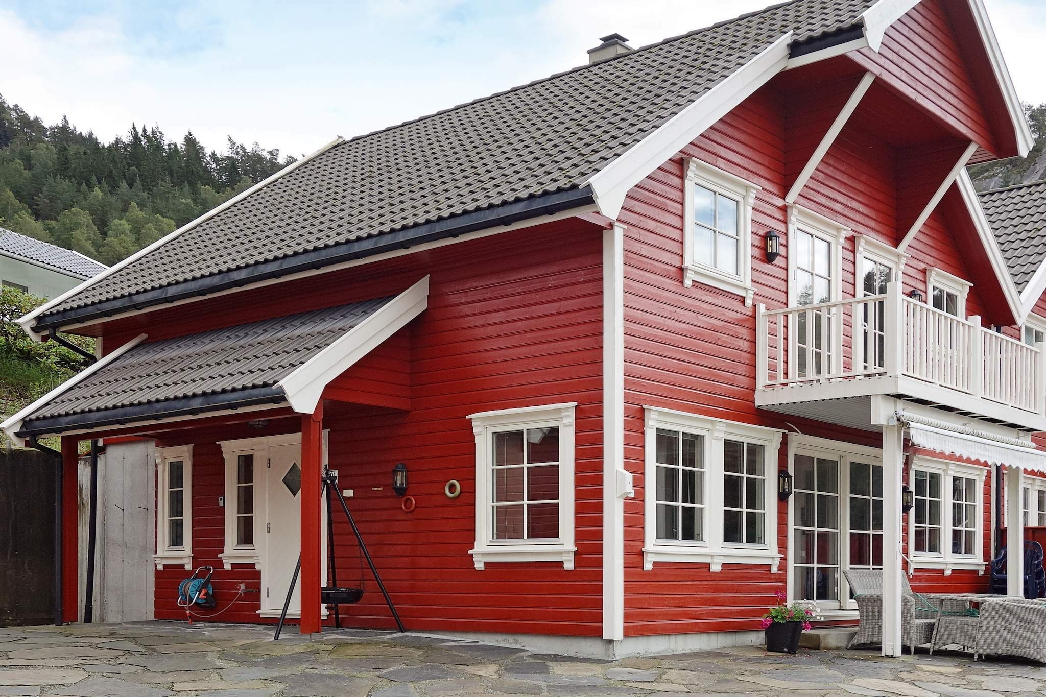 If you wish to live in a large, well-equipped holiday cottage 3 metres from the sea, with boats for rent, this is the place for you! From the cottage you can enjoy the view of the fjord and fire up the grill with today's catch. This large house with 3 floors and room for 11 people, has an idyllic location on a dock in a maritime environment. It is perfectly set up for fishing. You can rent boats just outside your living room. The cottage has a practical set up. There are 4 bedrooms and a mezzanine. In addition to the registered beds, there are extra beds available, and thus the capacity is 13 people in the house. There is a living room with a dining table on ground floor and a living room with a TV on 1st floor. The 200 litre freezer is located in a storage room. Here you also find life jackets. Outside there is a sheltered area with furniture, where you can relax while watching boats pass by. There is a grass field and playground where you can play football and volleyball. There is a bathing ladder on the dock, approx. 10 metres from the house. There is plenty of fish to catch, as well as crab and mussels. Good fishing spots can be found marked on a map in the cottage. You can also go ice fishing in winter, in the mountain lakes. There is a river with trout and salmon, with the fishing season opening respectively May 1st and June 20th. The famous pulpit rock is a two hour drive away. Possibility to book use of a sauna (room for 5-6 people) for NOK 50,-. The sauna is shared with the other units of the holiday complex.