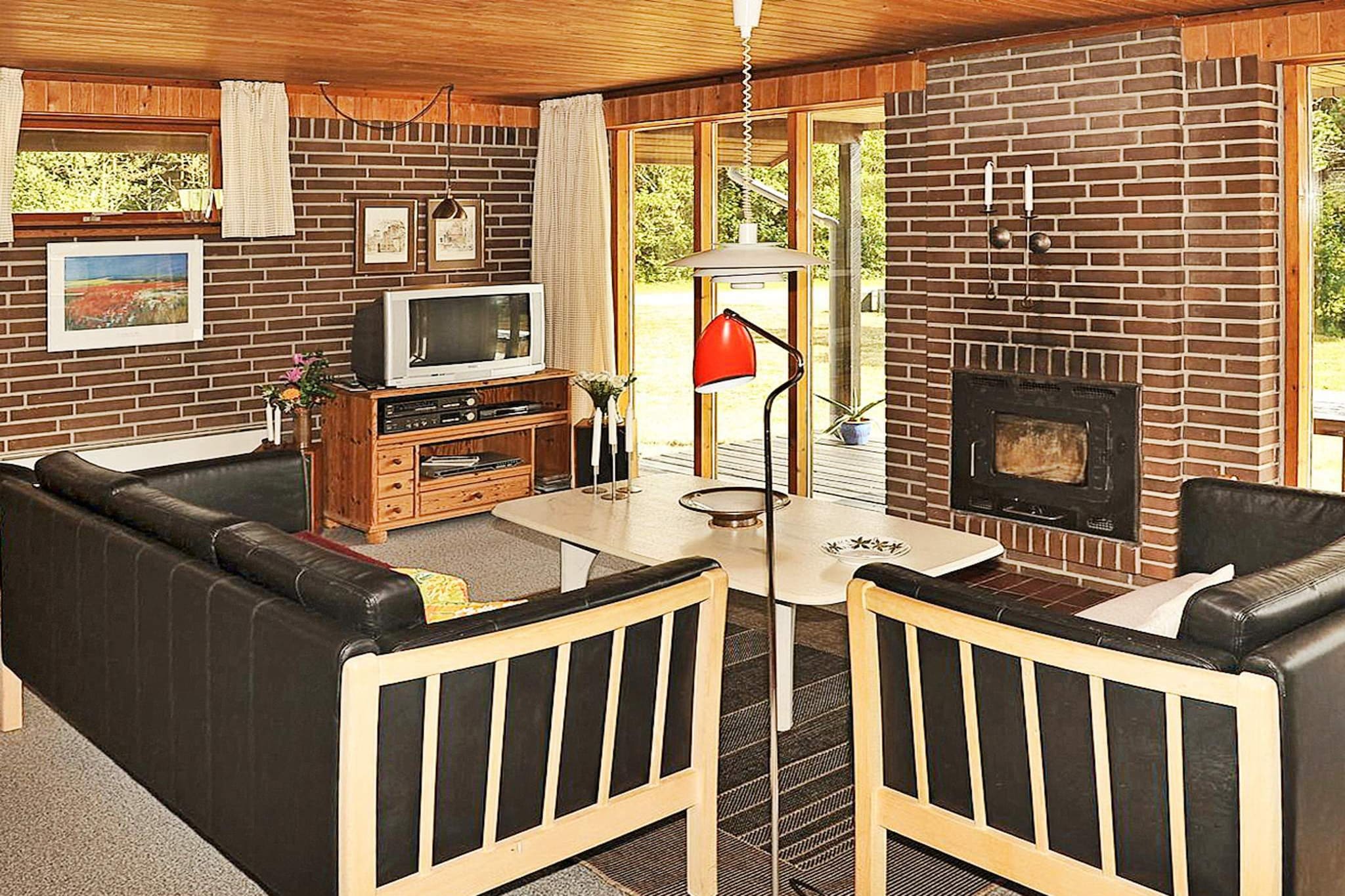 Cosy holiday cottage on a natural plot with a large lawn. There is a partly covered terrace with garden furniture. The kitchen from 2012 is well-equipped with a dish washer and large fridge-freezer. The well-furnished and cosy living room has a wood-burning stove, stereo set, DVD player and cable-TV. 30/30 Mbit internet. Two bedrooms and bathroom with a shower cubicle. The house has a quiet location and there is a carport.A refundable deposit might be charged closer to your check-in date. The security deposit ensures a smooth stay and covers any additional services or consumption charges.This deposit covers utilities consumed during your stay and any additional services that may be taken.The final amount will be adjusted based on actual meter readings, actual usage of extra services, and any remaining balance will be refunded within 21 days after checkout.This deposit simply acts as a prepayment for charges that  you would anyways pay for, ensuring a seamless stay and check-out experience.