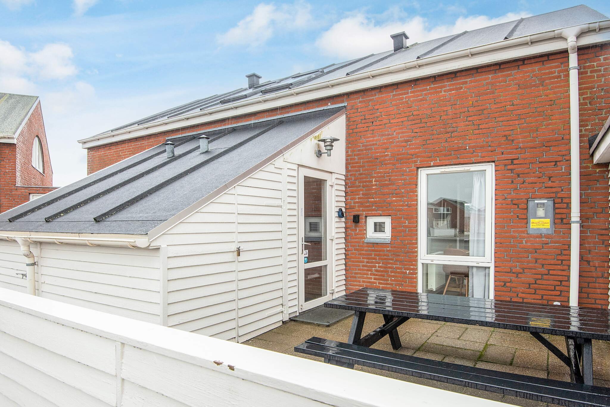 By renting this row house at Rim Holiday Centre, you get access to the centre's facilities like indoor and outdoor swimming pools. From the cottage's terrace, enjoy the view of golf courses and ships passing by. The house has two floors. The kitchen has an open connection to the dining section and living room, with access to the south-facing terrace. Close proximity to the beach and Havneby town. A refundable deposit might be charged closer to your check-in date. The security deposit ensures a smooth stay and covers any additional services or consumption charges.This deposit covers utilities consumed during your stay and any additional services that may be taken.The final amount will be adjusted based on actual meter readings, actual usage of extra services, and any remaining balance will be refunded within 21 days after checkout.This deposit simply acts as a prepayment for charges that  you would anyways pay for, ensuring a seamless stay and check-out experience.