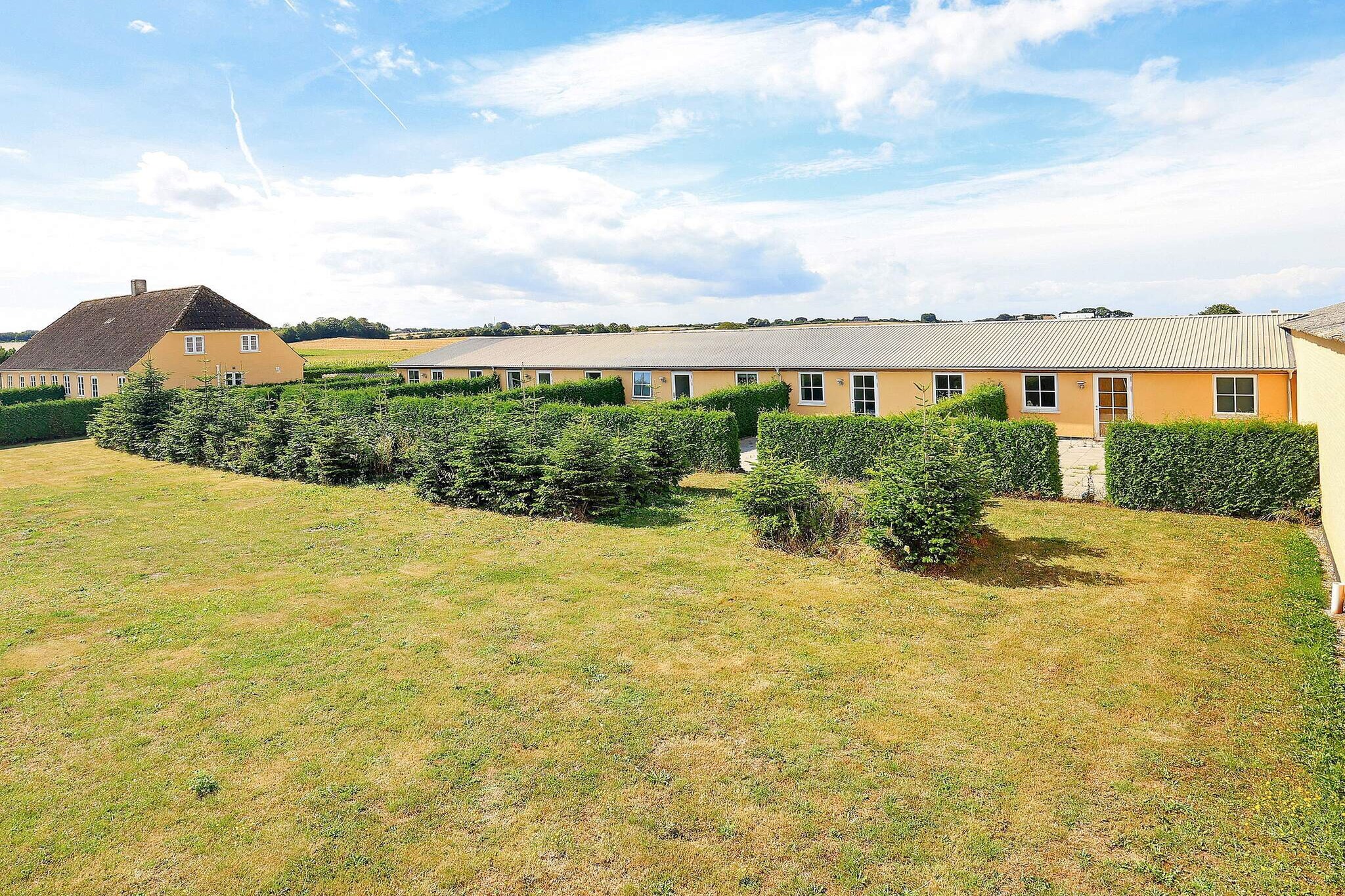 A holiday apartment with two floors and a terrace in front of the house. The apartment is only 400 metres from the coast, where you find great fishing conditions. The apartment is on ground floor. The bright bedrooms on 1st floor has sloping walls and two single beds each. Access to washing machine and tumble dryer in the area.A refundable deposit might be charged closer to your check-in date. The security deposit ensures a smooth stay and covers any additional services or consumption charges.This deposit covers utilities consumed during your stay and any additional services that may be taken.The final amount will be adjusted based on actual meter readings, actual usage of extra services, and any remaining balance will be refunded within 21 days after checkout.This deposit simply acts as a prepayment for charges that  you would anyways pay for, ensuring a seamless stay and check-out experience.