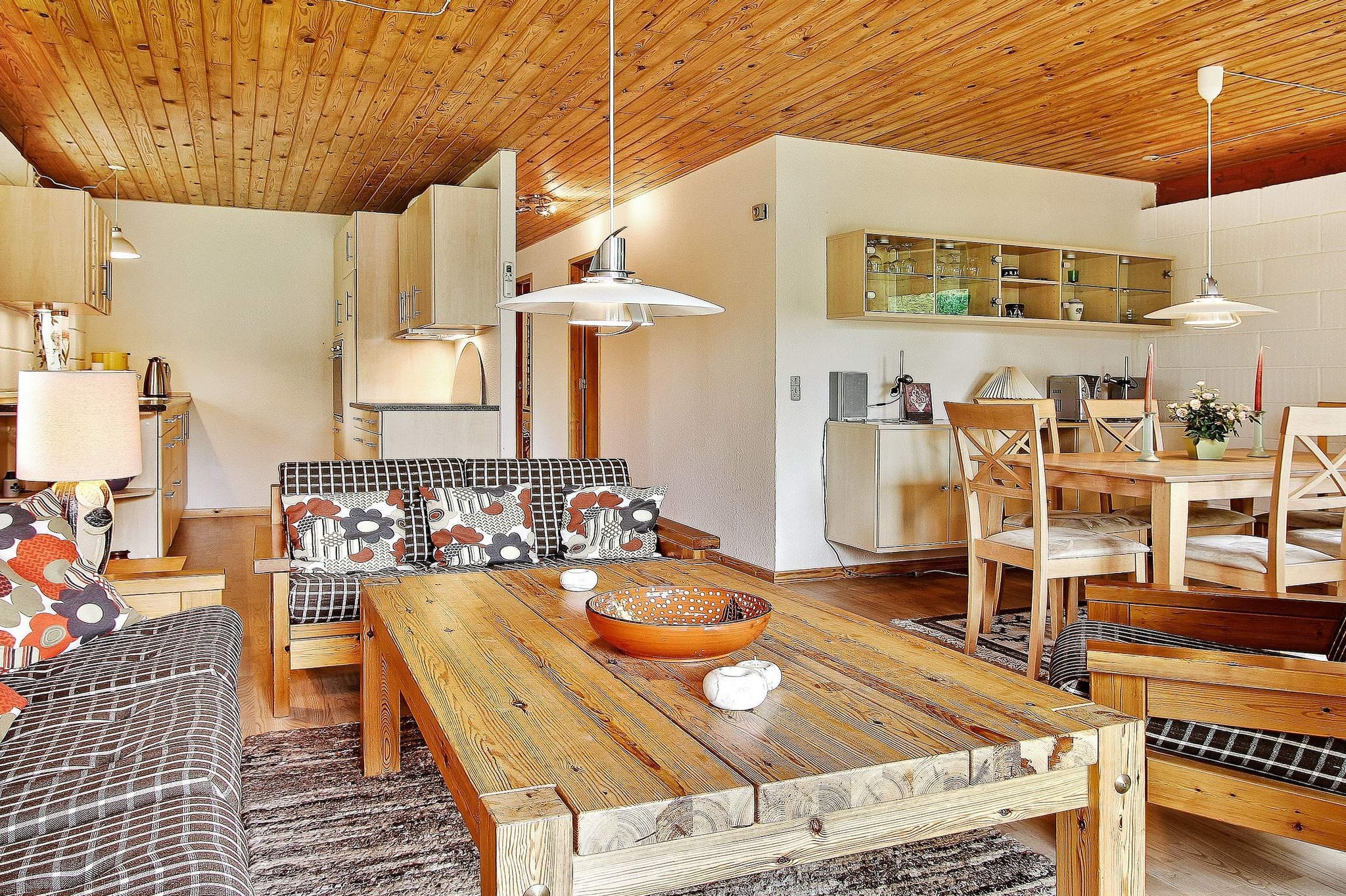 A modernised holiday cottage located in the outskirts of a quiet and scenic area, but still in biking distance to a child-friendly beach. The house has within recent years been modernised with a kitchen and domestic appliances and bright wooden floors. In the dining and living room there is a TV and wood-burning stove, and direct access to a partly covered terrace. 2 bedrooms, both with double bed (1½ man double bed). Closed garden with plants and trees where children can rump around. Carport. The house is located on the same road as unit 28502, so if you are several people that go on holiday together, you can rent both units and be close to each other.A refundable deposit might be charged closer to your check-in date. The security deposit ensures a smooth stay and covers any additional services or consumption charges.This deposit covers utilities consumed during your stay and any additional services that may be taken.The final amount will be adjusted based on actual meter readings, actual usage of extra services, and any remaining balance will be refunded within 21 days after checkout.This deposit simply acts as a prepayment for charges that  you would anyways pay for, ensuring a seamless stay and check-out experience.