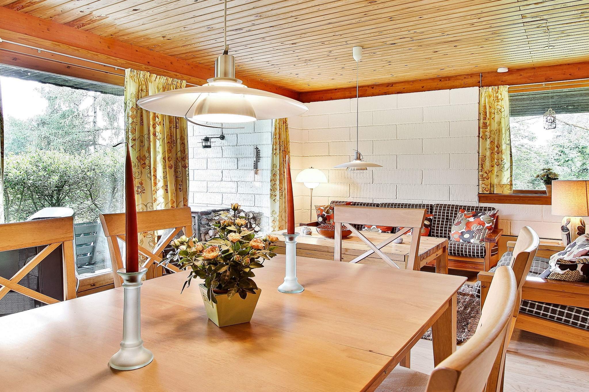 open kitchen(cooker(electric), hood, coffee machine, fridge(+ freezer), washing machine), Living/bed room(TV(satellite), DVD player, CD player, stereo unit), bedroom(double bed), bedroom(double bed), bathroom(bathtub or shower, washbasin, toilet), carport, heating(electric), terrace, BBQ, air to air heatpump