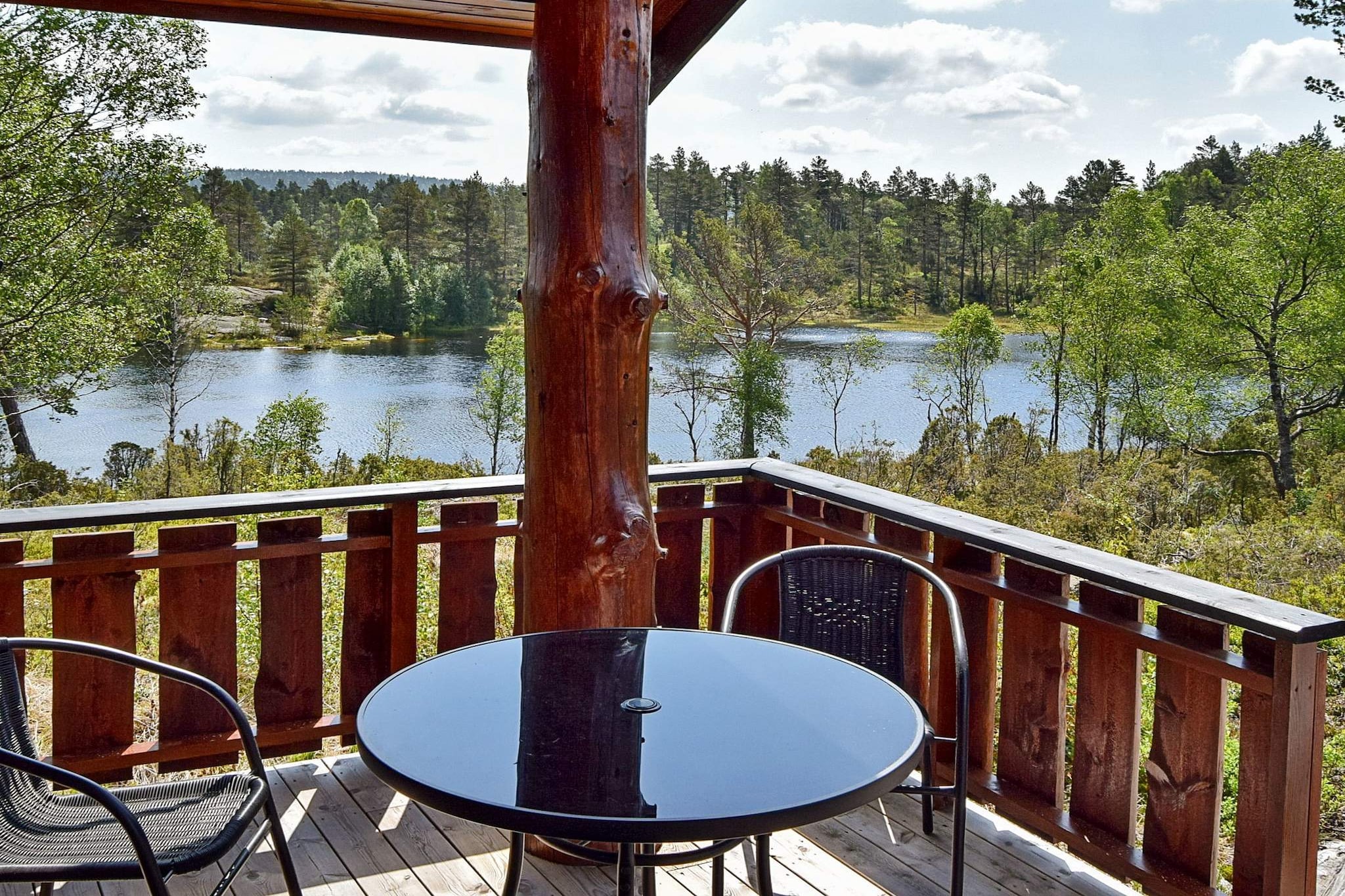 A spacious and welcoming holiday cottage from 2016 with sauna. Lovely view of a lake surrounded by forest. Enjoy your holiday both indoor and outdoors. This is a bright cottage with plenty of space, and you can relax in the inside sauna or outdoor on the terrace. The living room is comfortably furnished and has a wood-burning stove. The holiday cottage has a practical plan arrangement. From the bathroom you can access the infra-red sauna. From the entrance you can enter a large living room with an open, well-equipped kitchen/dining section. The living room is connected to the large terrace.  The terrace is partly covered and you can admire the wonderful view of the area and nearby lake. The cottage is only 50 metres from a fishing lake, with many hiking options in the forest nearby. You might be able to catch a glimpse of the wildlife of the area, like moose deer, grouse and more. On the terrace there is a grill at your disposal. There is also a rowing boat included in the rent. Larger groups can also rent the neighbour cottage, unit 36672, only 60 metres away (pets allowed). PS: You must bring Bedlinen, not possible to rent! Remember life jackets for the rowing boat.